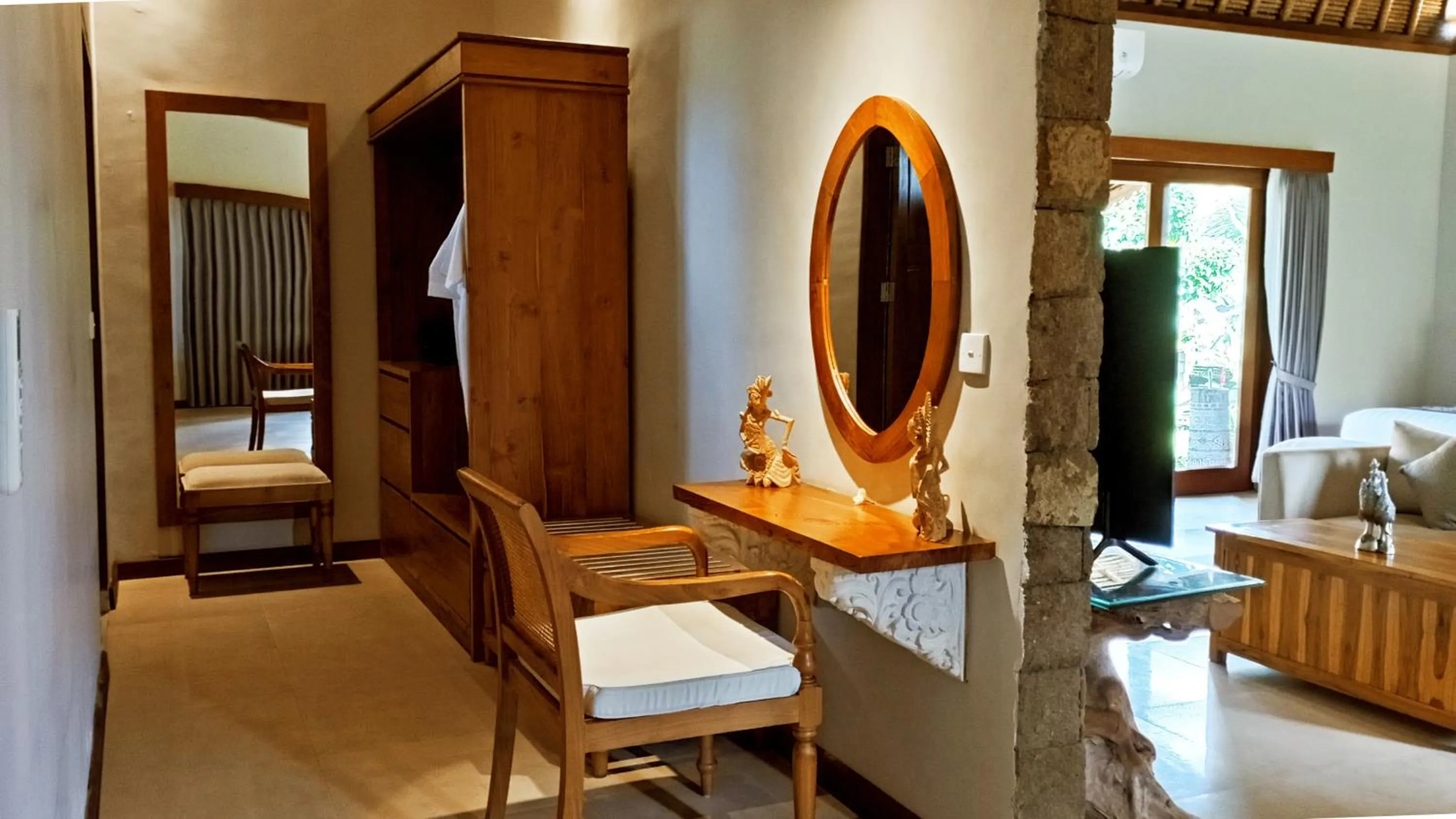 Seating area, Bed in Puri Andong Villa