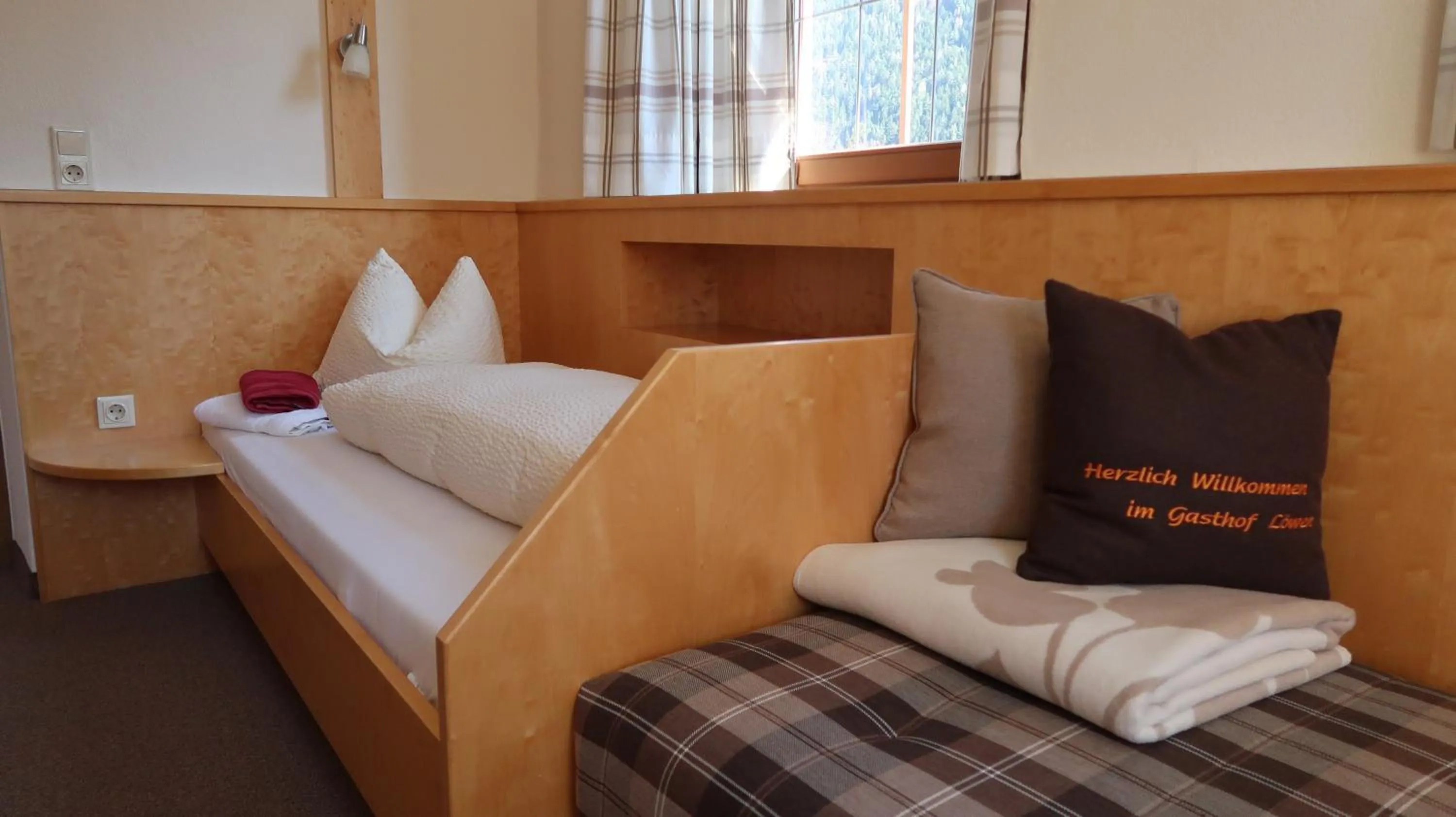 Bed in Hotel Garni Löwen