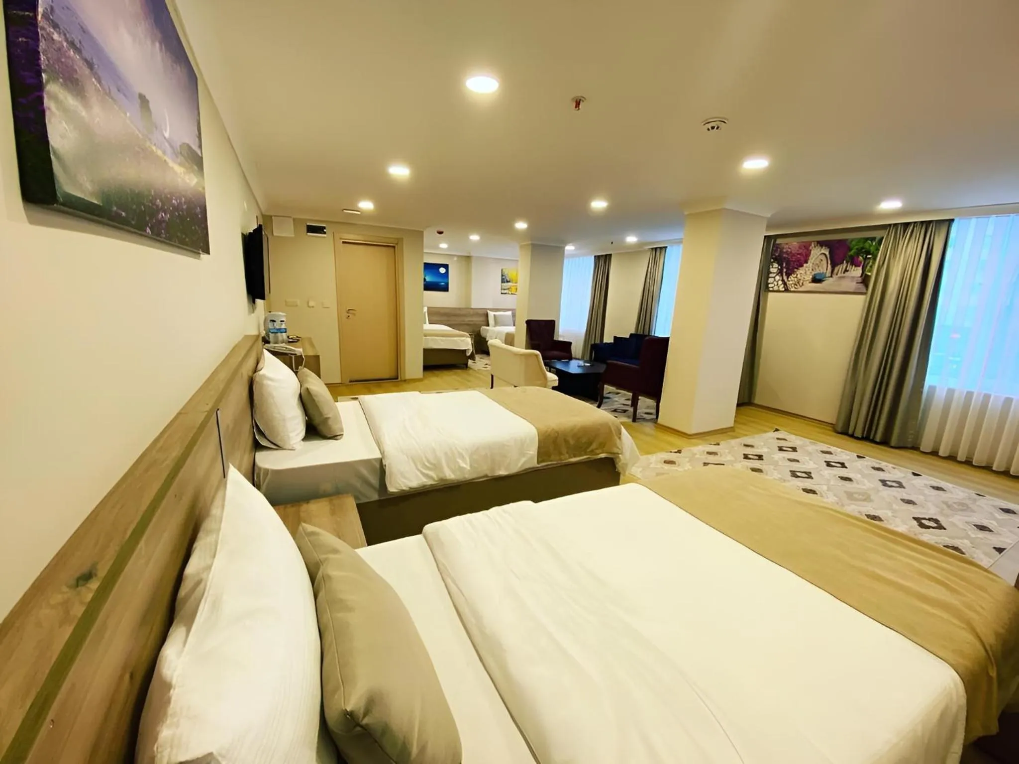 Communal lounge/ TV room, Bed in Şimal Hotel