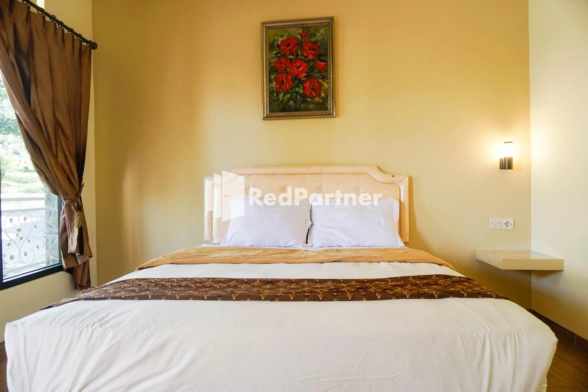 Bed in Griya Imafa Inn RedPartner near Jatim Park 2