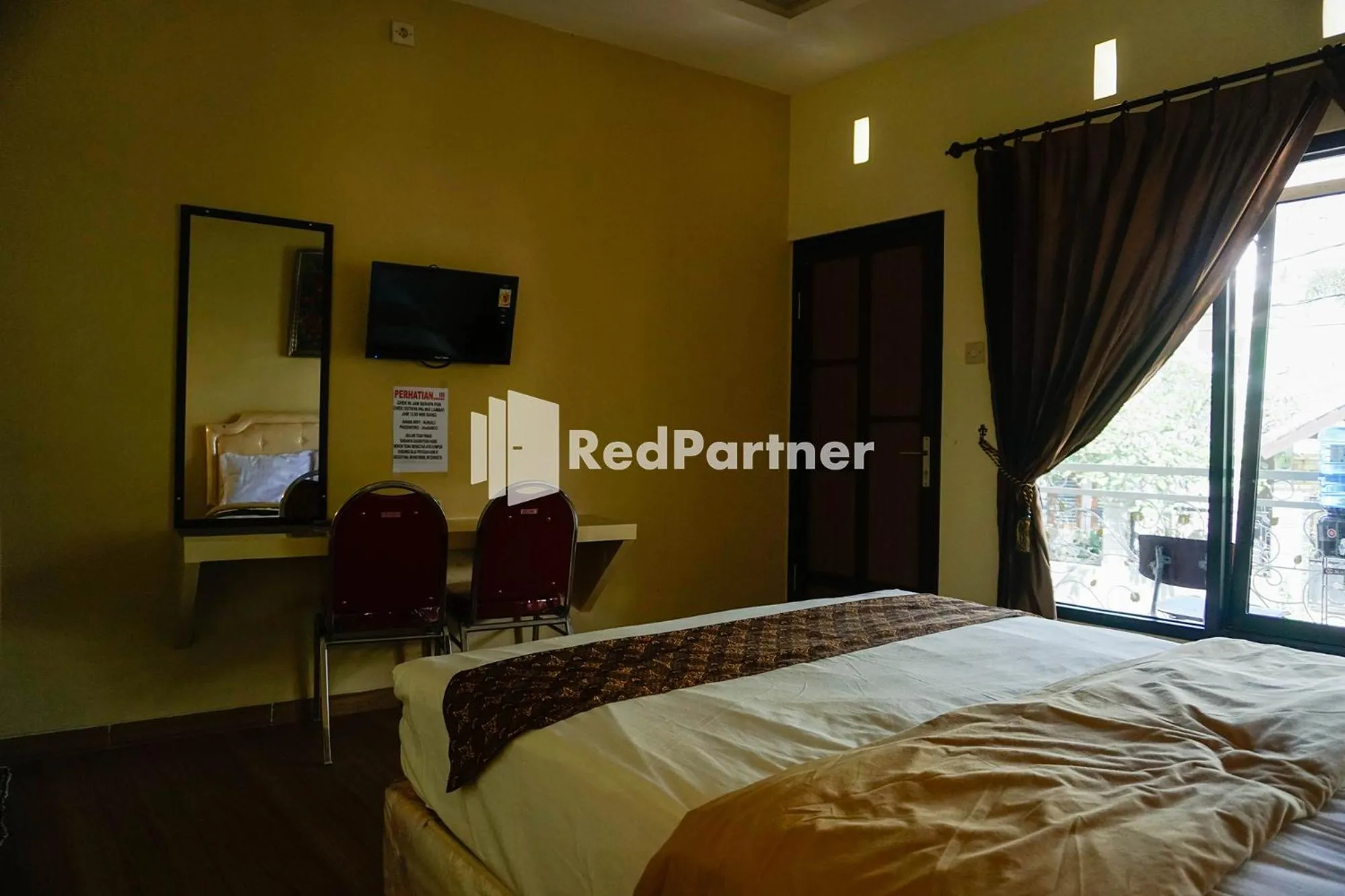 Bed in Griya Imafa Inn RedPartner near Jatim Park 2