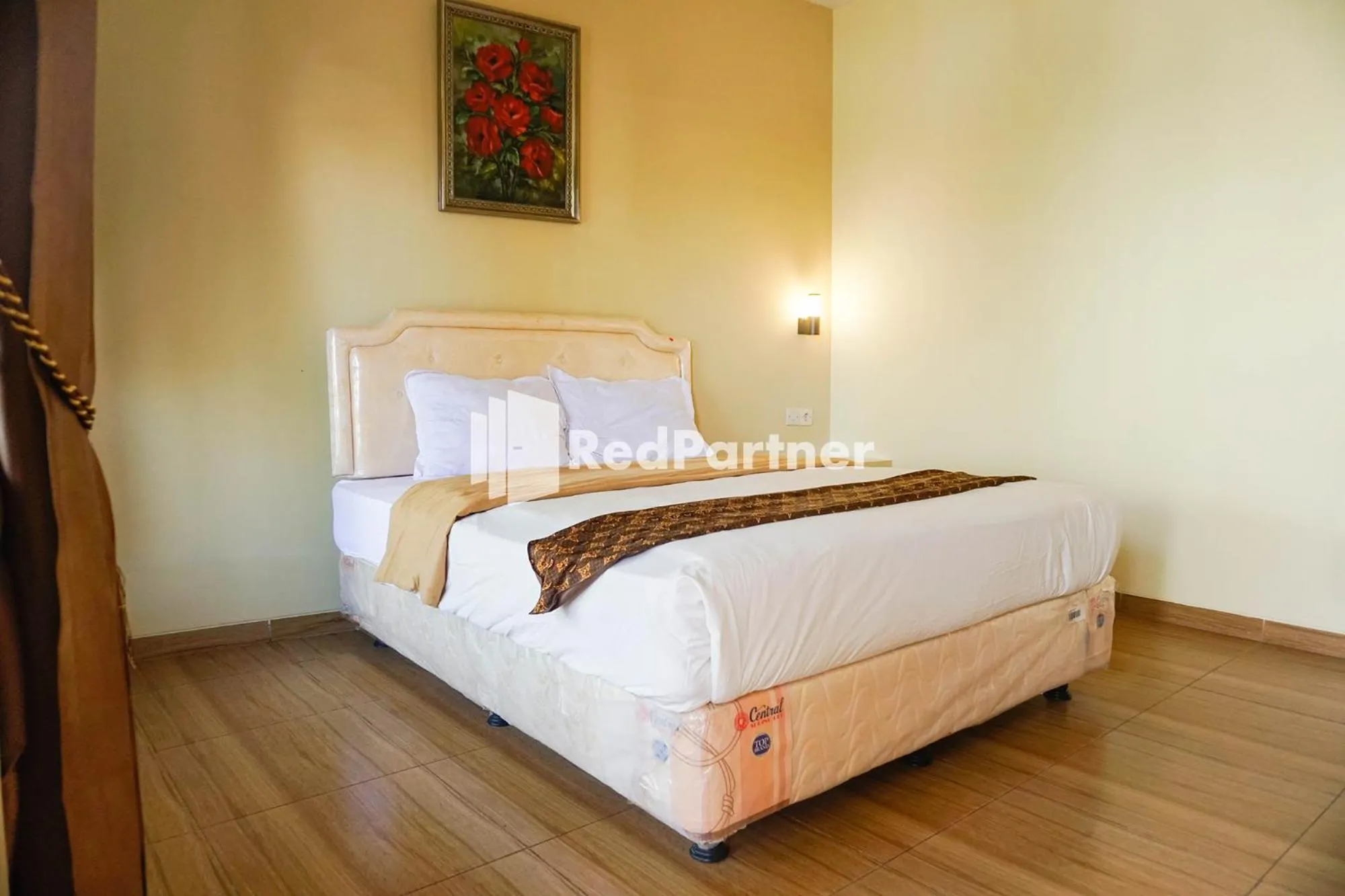 Bed in Griya Imafa Inn RedPartner near Jatim Park 2