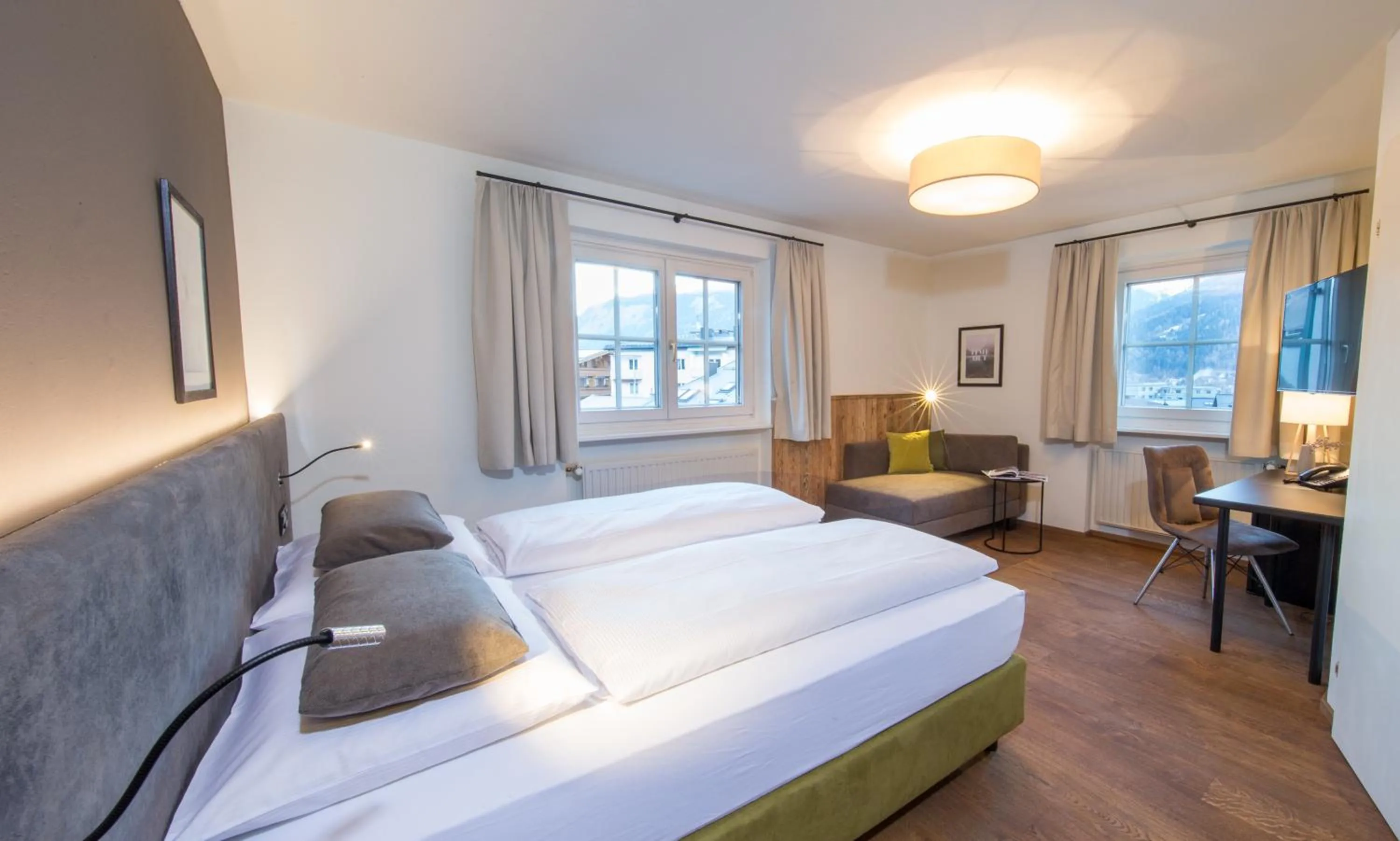 Photo of the whole room, Bed in HEITZMANN - Hotel & Rooftop