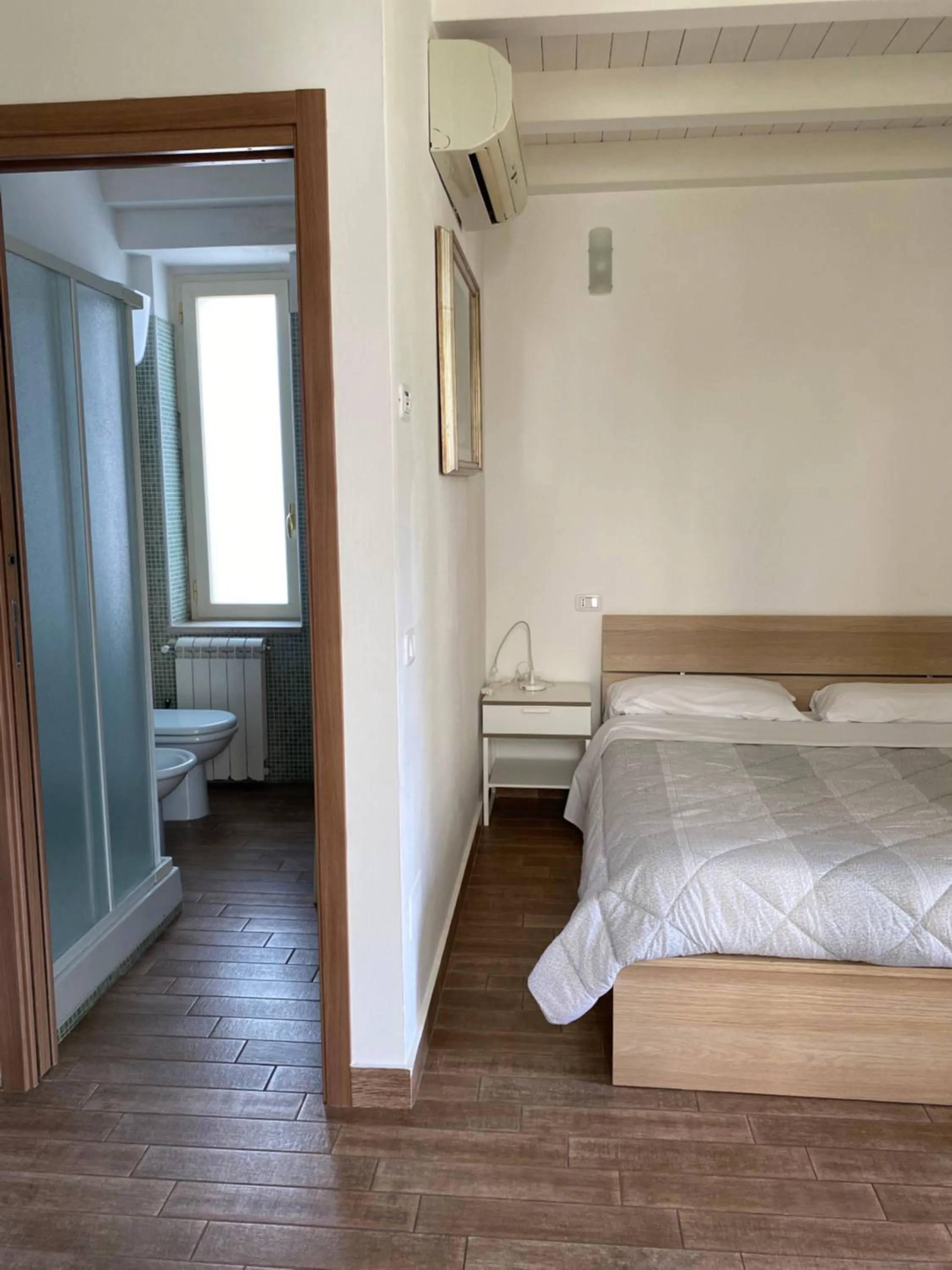 Bed in Villa Scotillo Boutique Hotel