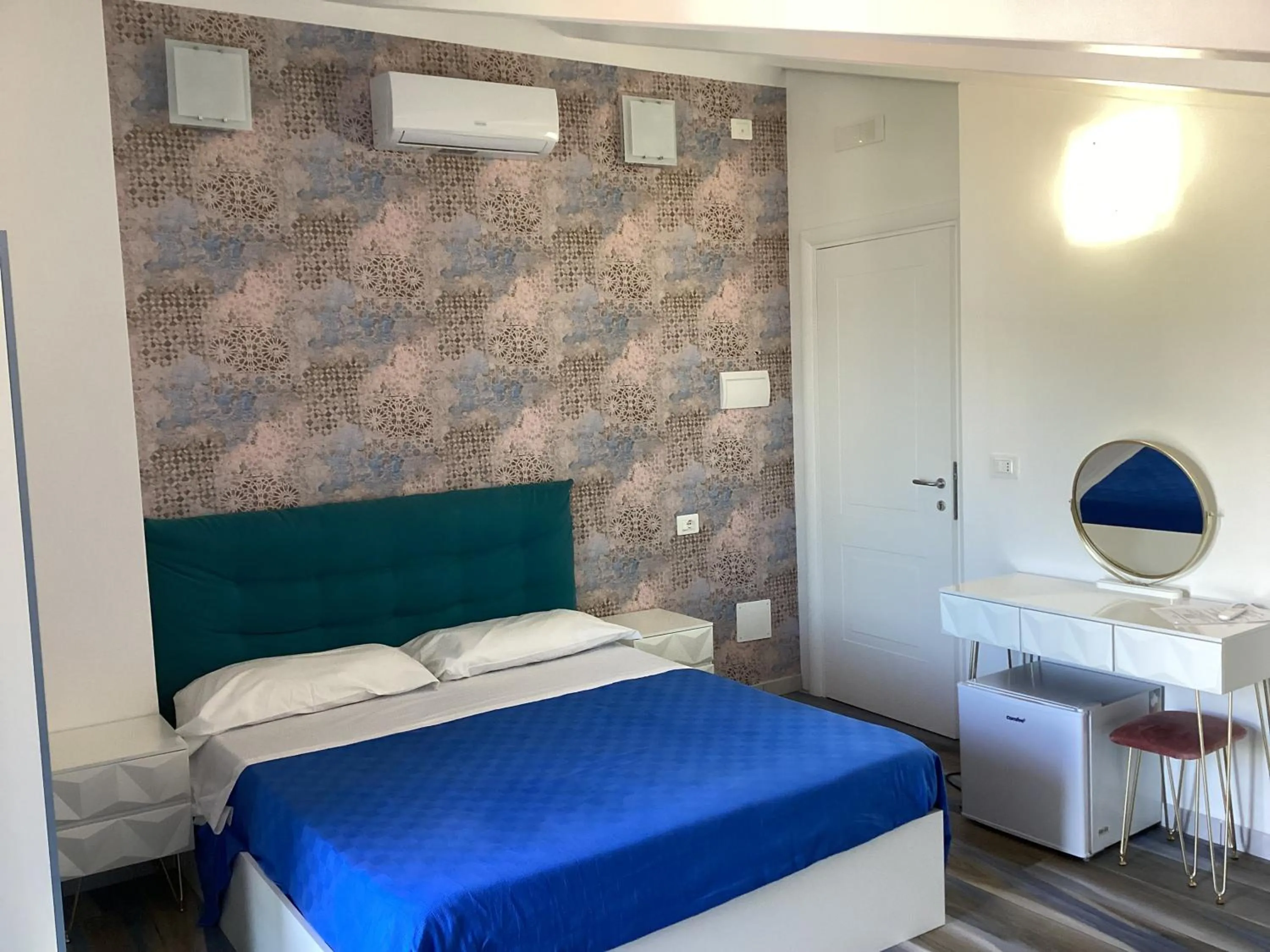 Bed in Villa Scotillo Boutique Hotel