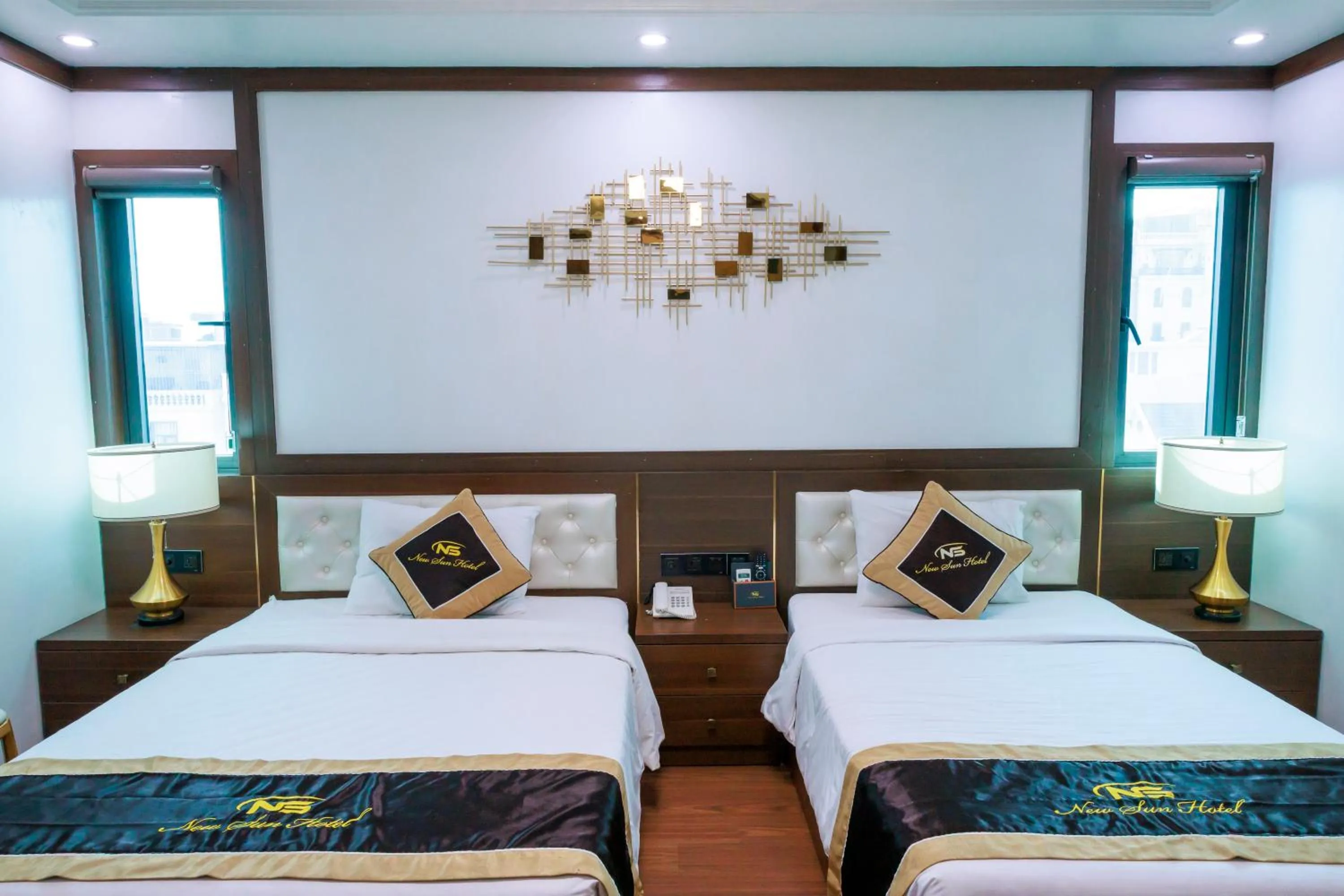 Bed in New Sun Móng Cái Hotel