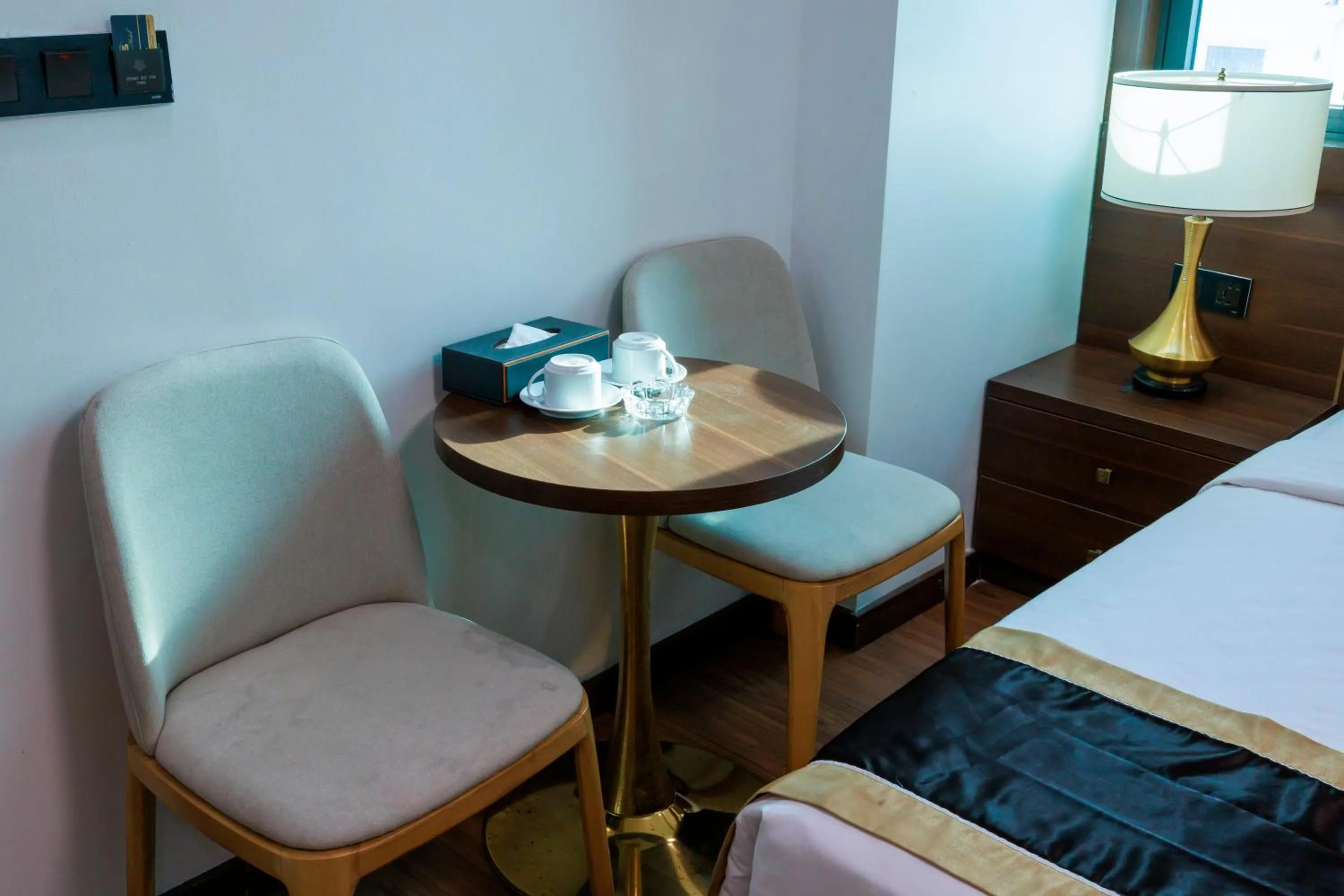 Seating area, Bed in New Sun Móng Cái Hotel