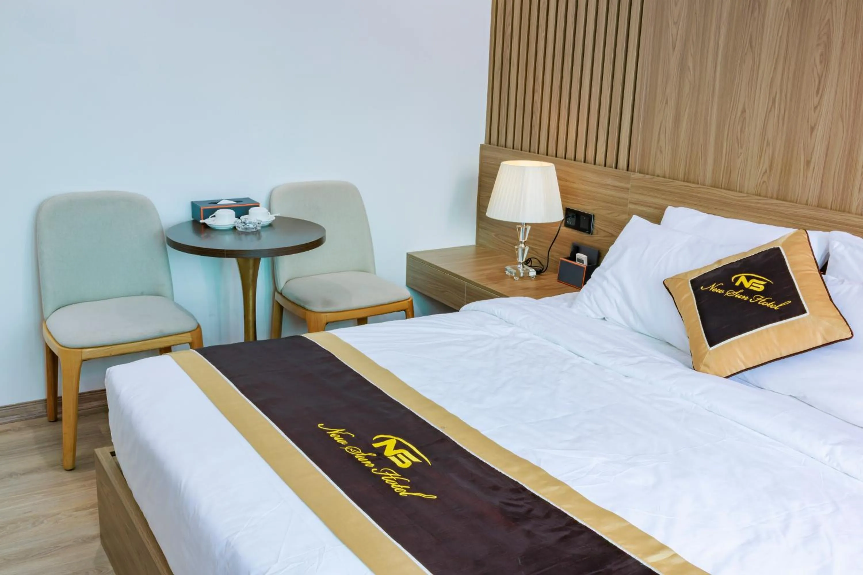 Bed in New Sun Móng Cái Hotel