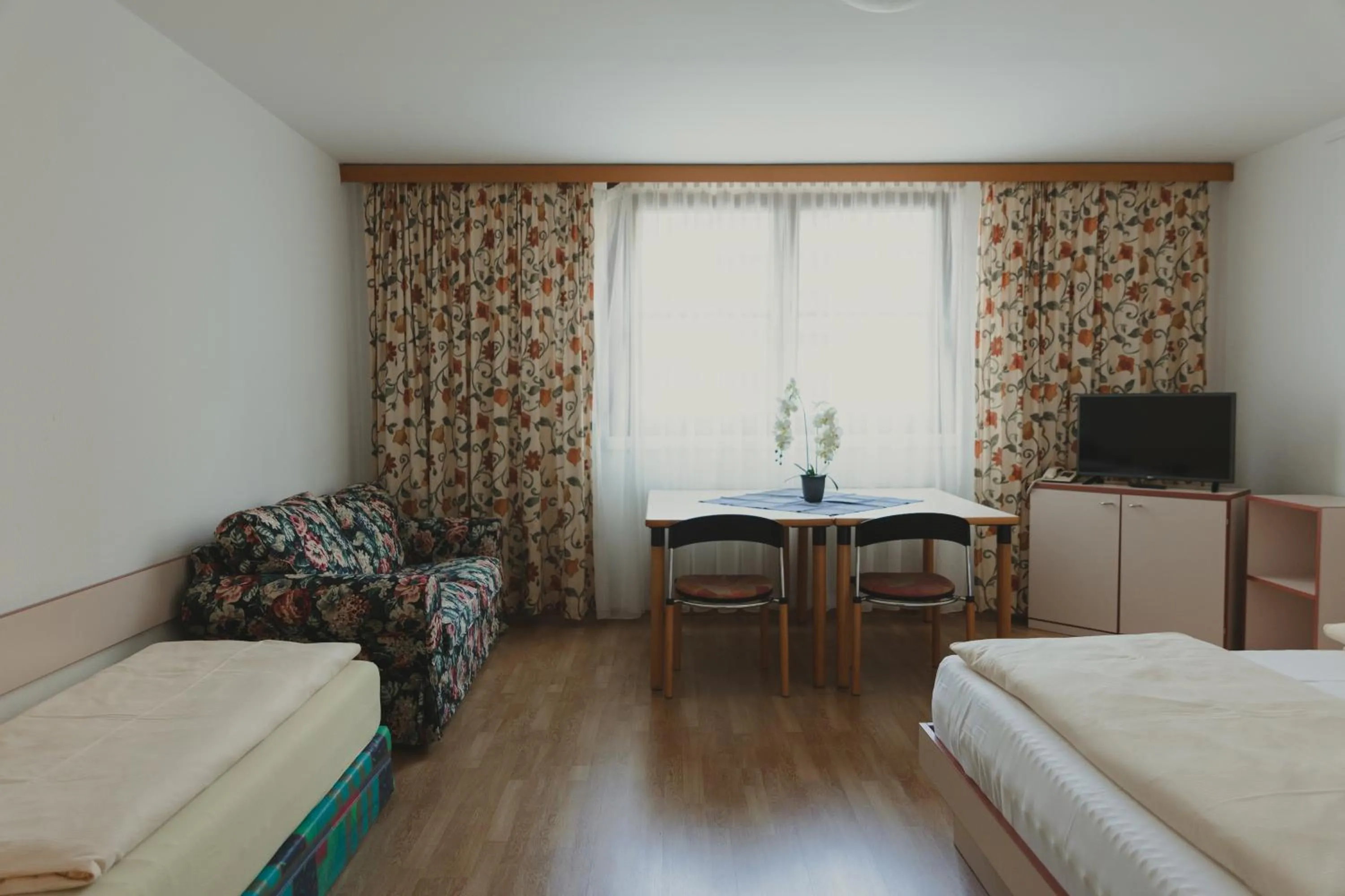 Photo of the whole room, Bed in Sommerhotel Karwendel