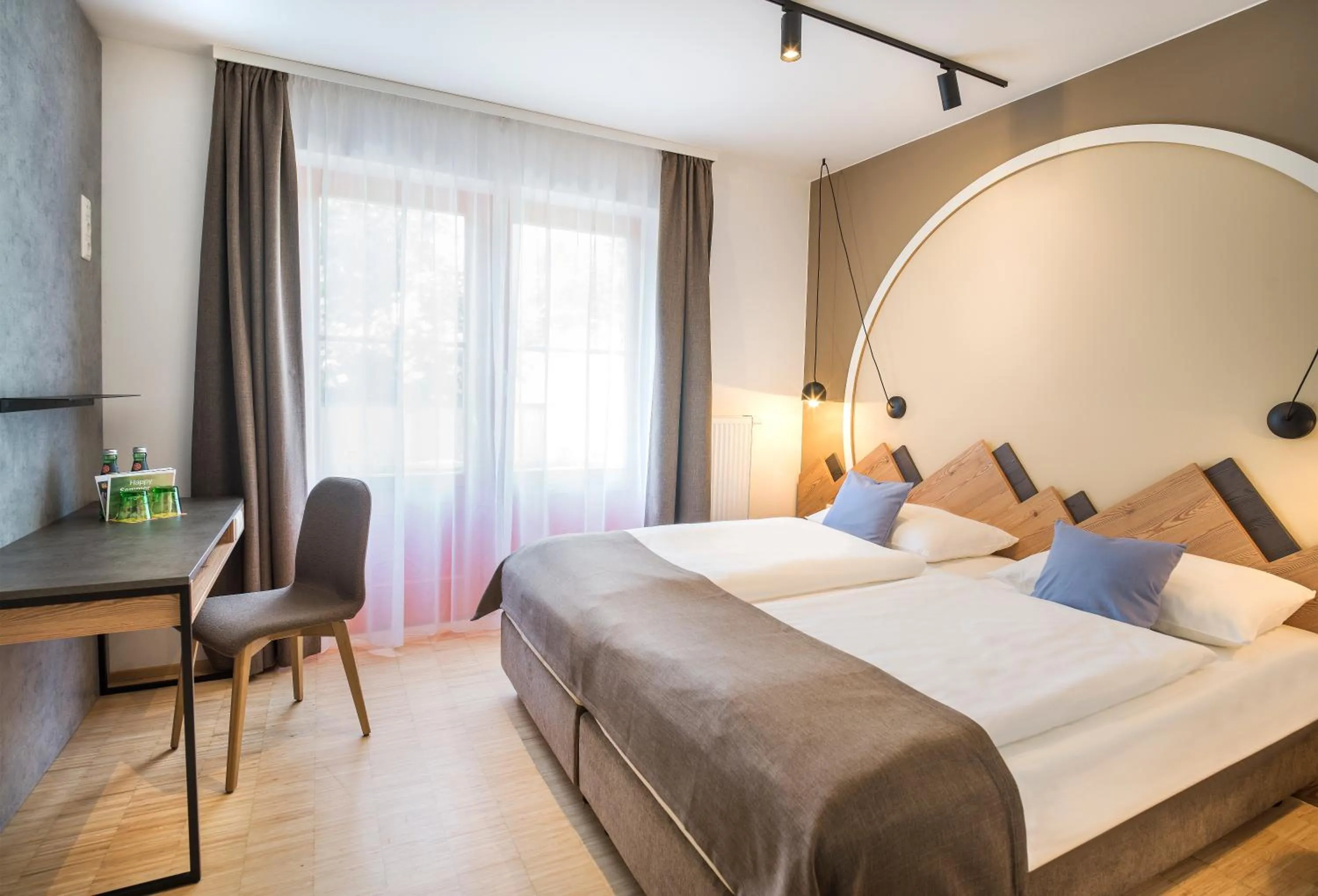 Photo of the whole room, Bed in JUFA Hotel Wipptal