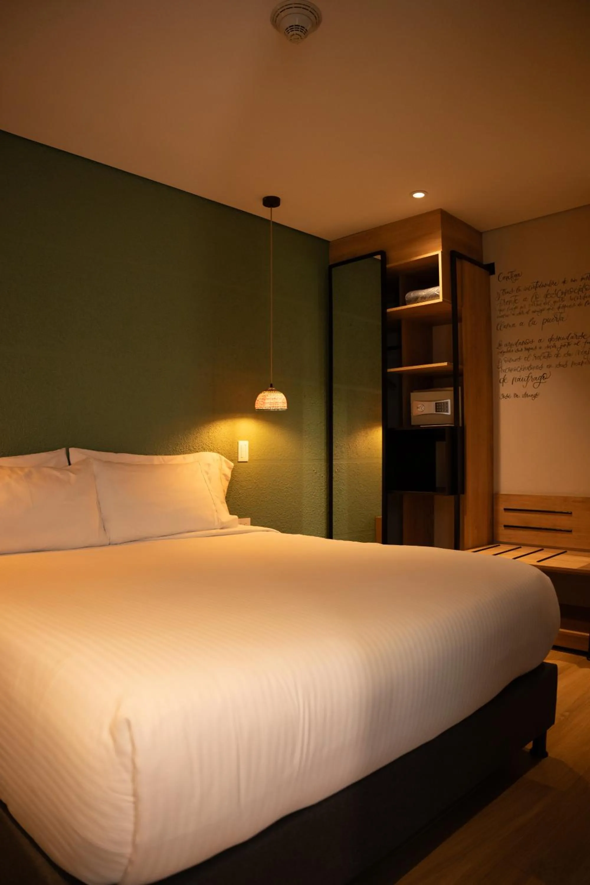 Bed in Casa Rose Hotel