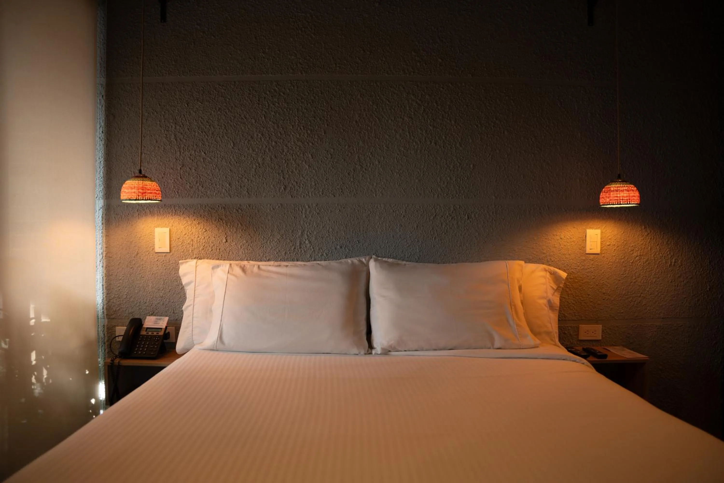 Bed in Casa Rose Hotel