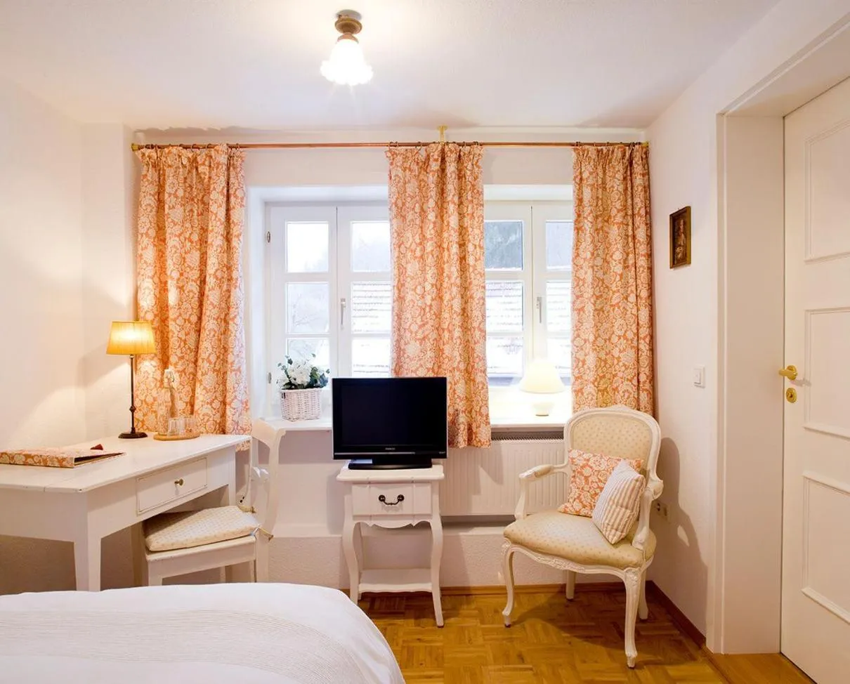Living room, Bed in Romantik Hotel Landhaus Bärenmühle