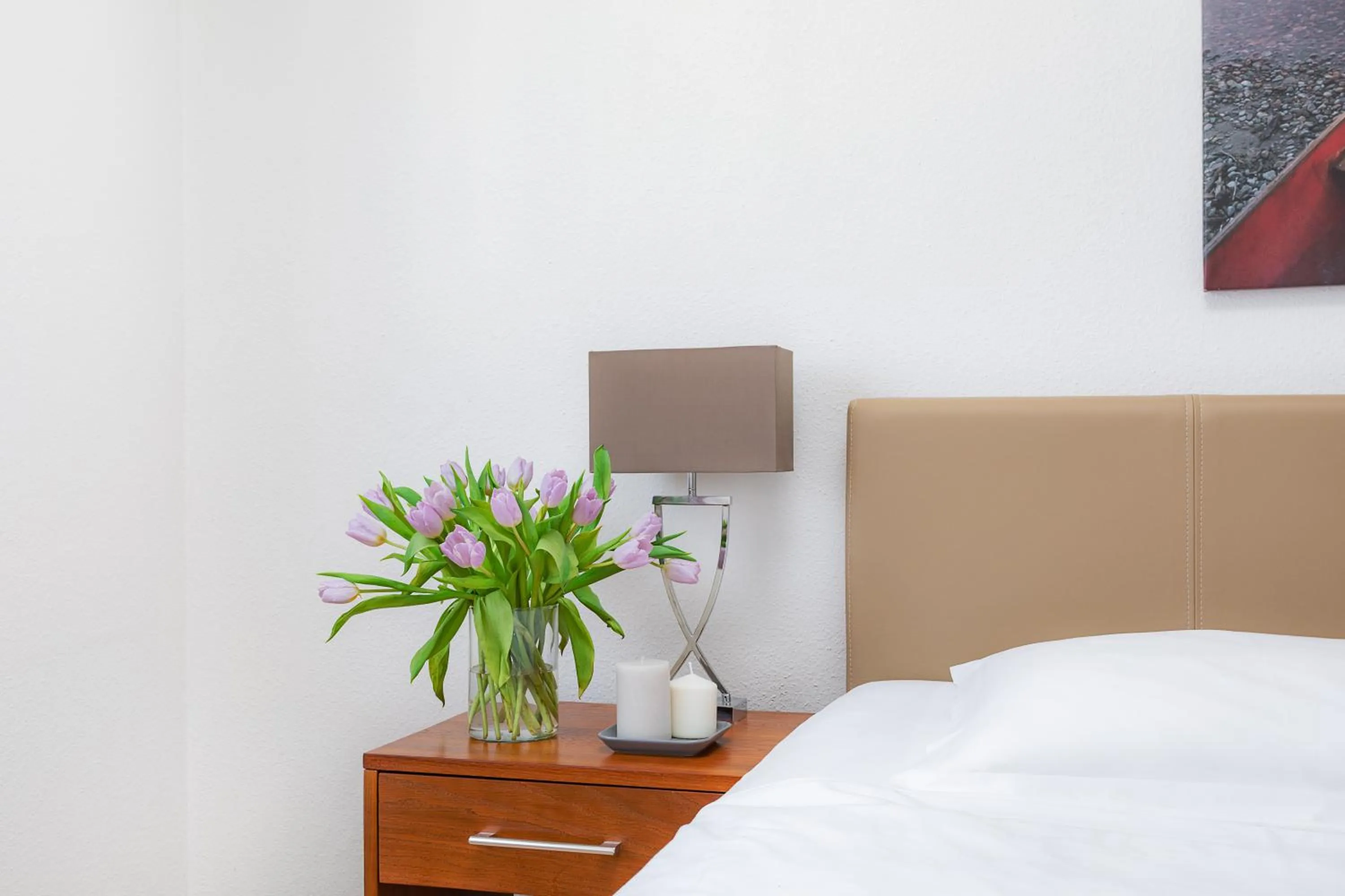 Photo of the whole room, Bed in Swiss Star Aussersihl - Self Check-In