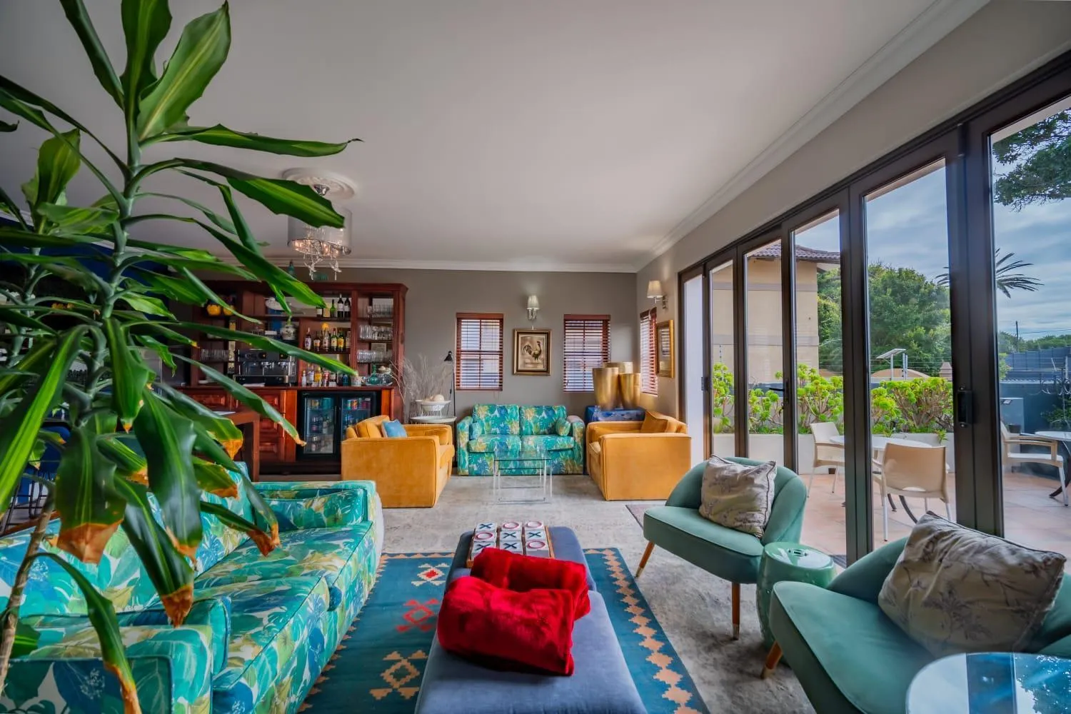 Communal lounge/ TV room in The Mandyville Jeffreys Bay