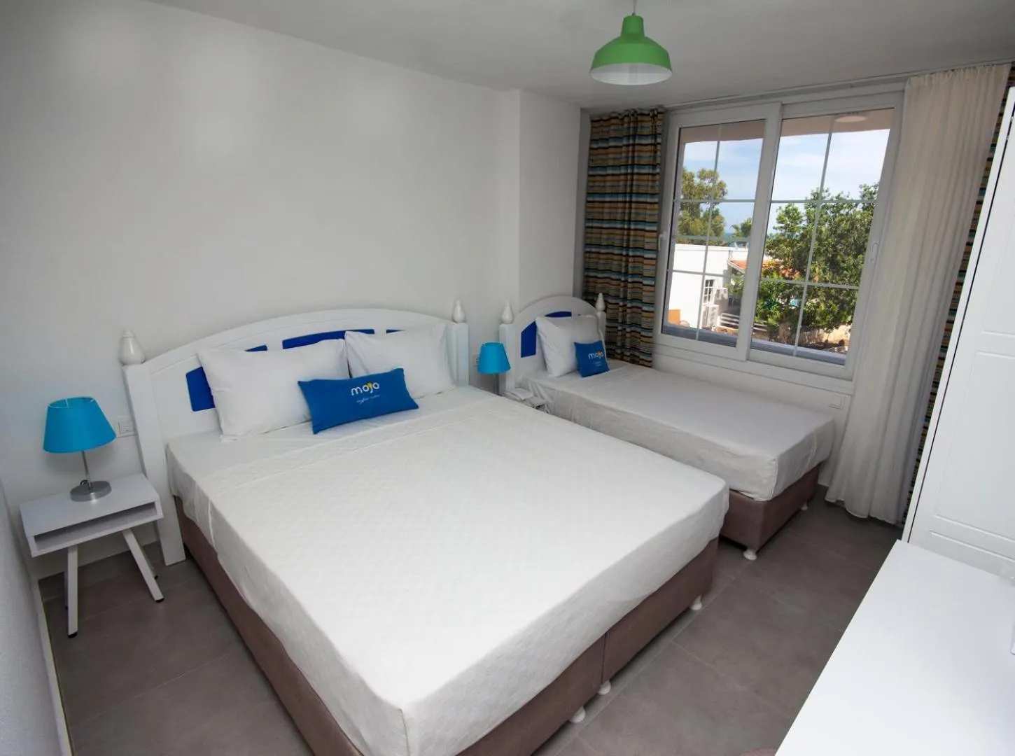 Bed in MOJO OTEL BEACH