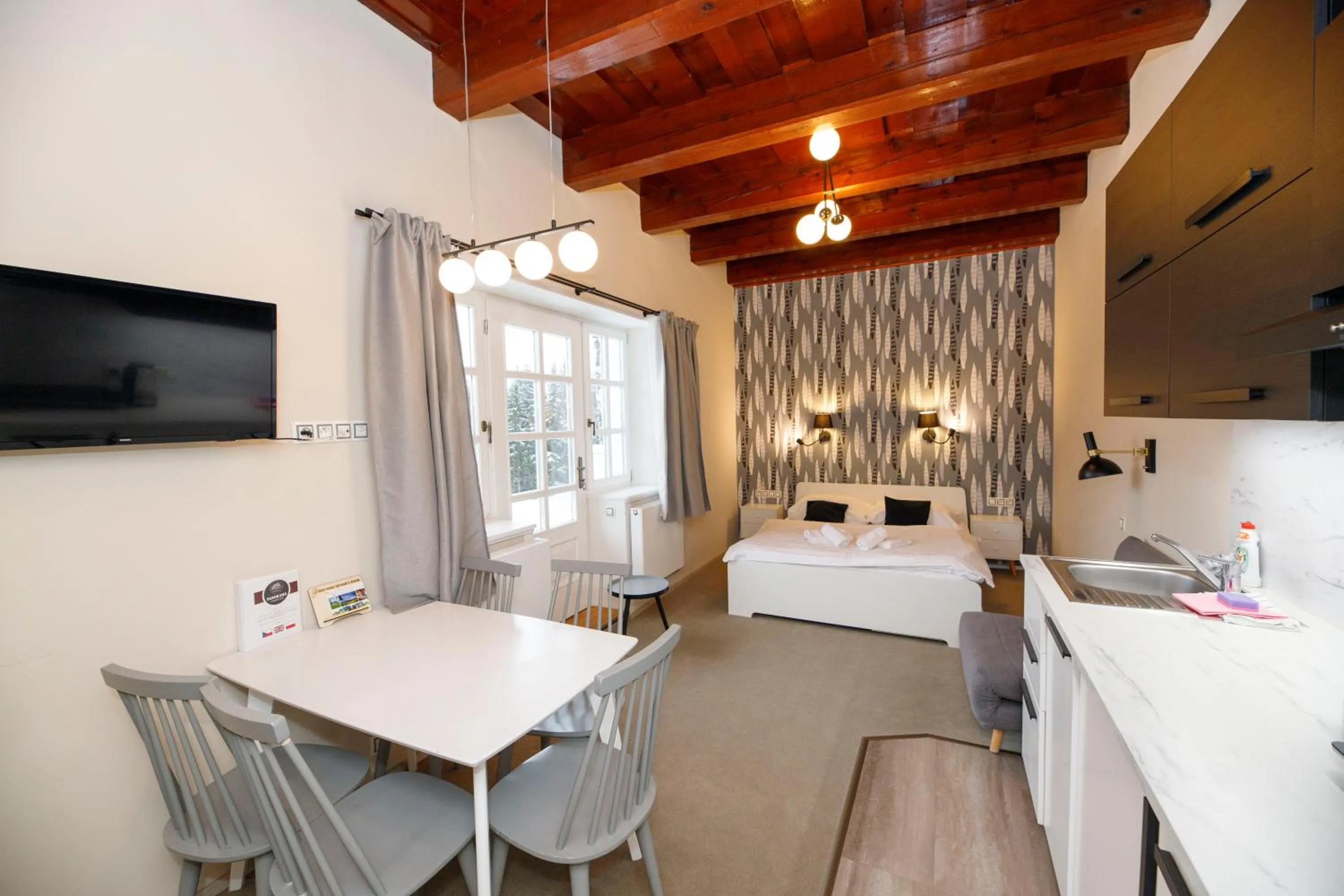 Kitchen or kitchenette, Bed in Aparthotel Panorama