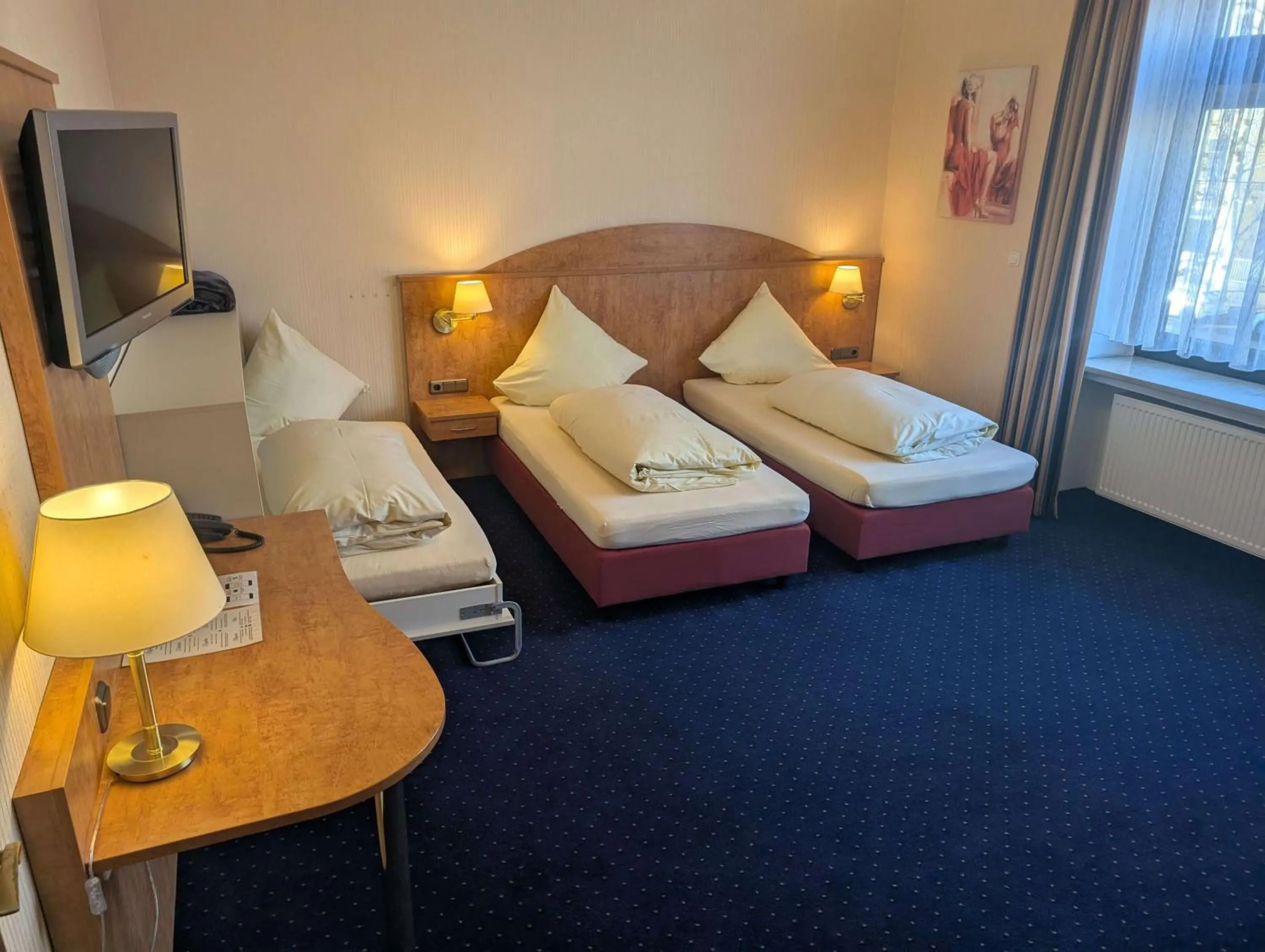 Bed in Stadthotel Augsburg