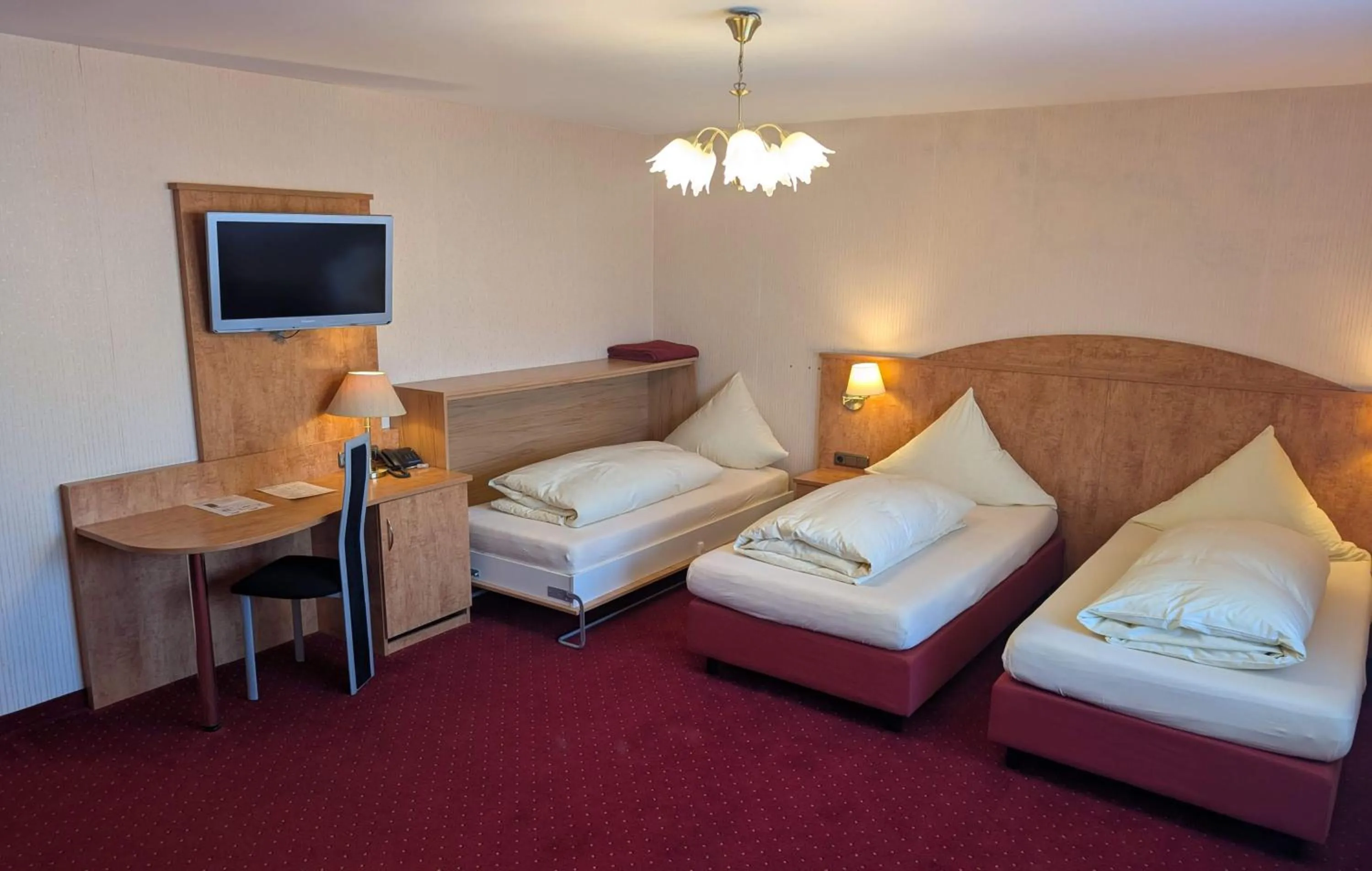 Bed in Stadthotel Augsburg