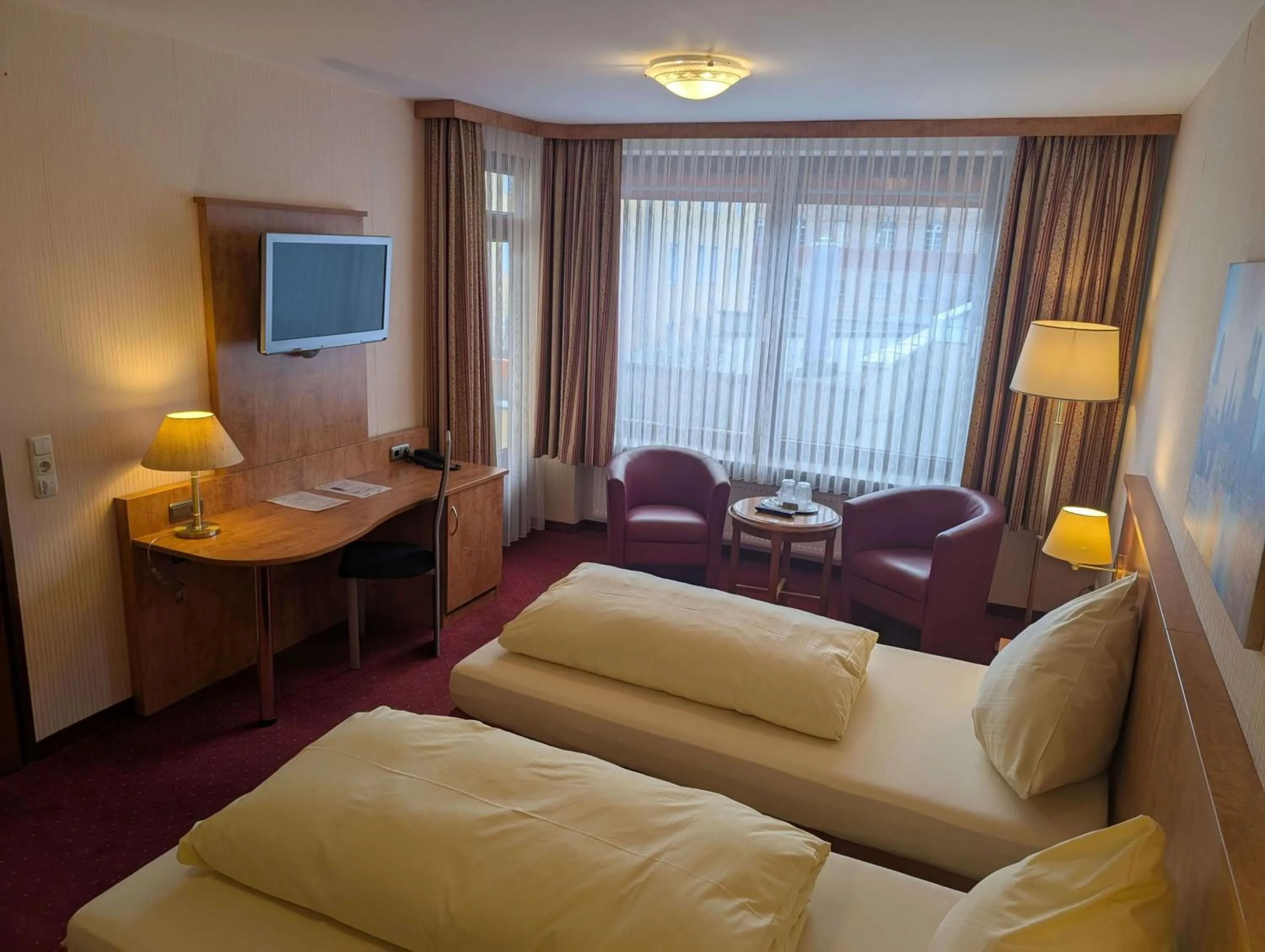 Bed in Stadthotel Augsburg