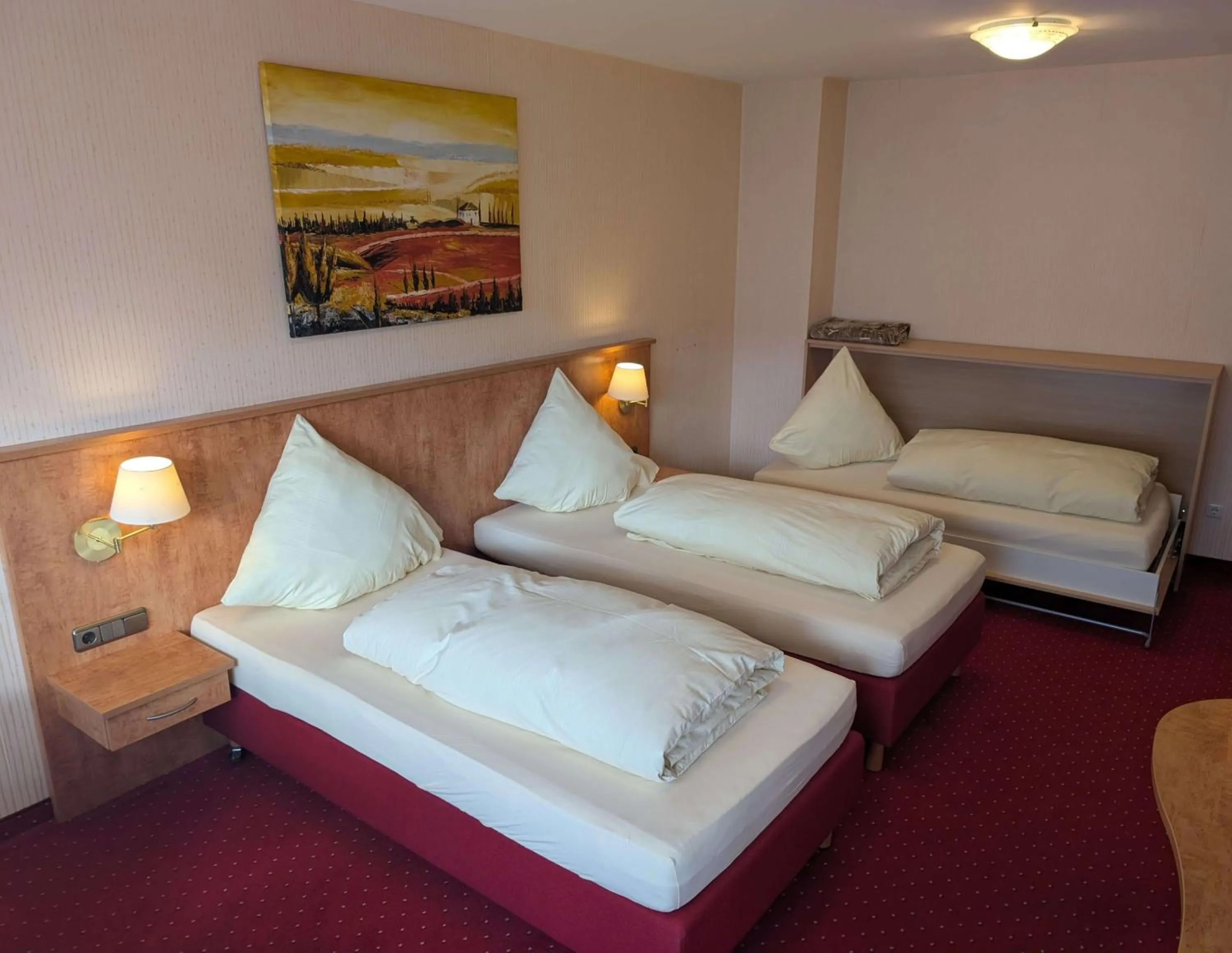 Bed in Stadthotel Augsburg