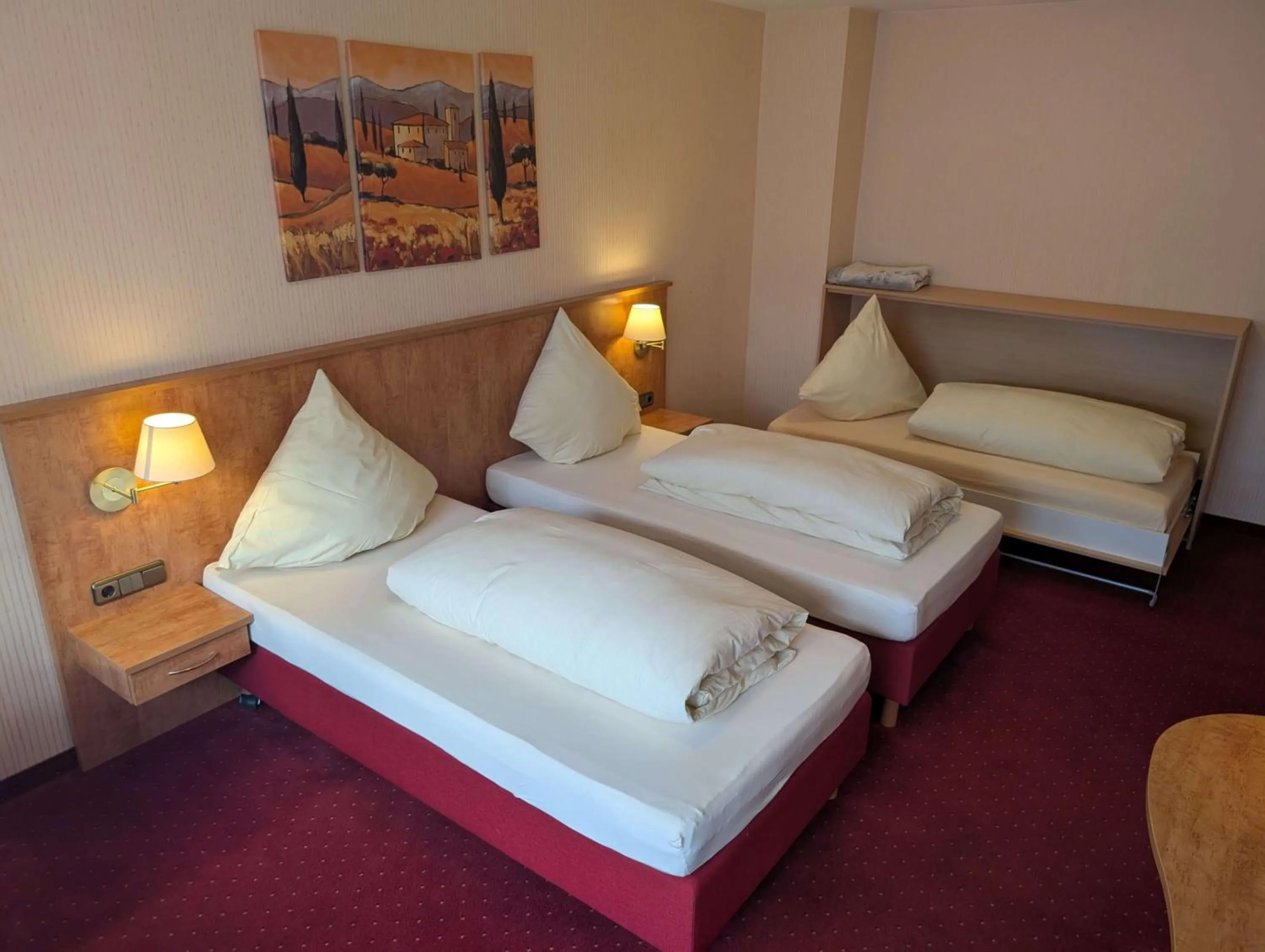 Bed in Stadthotel Augsburg