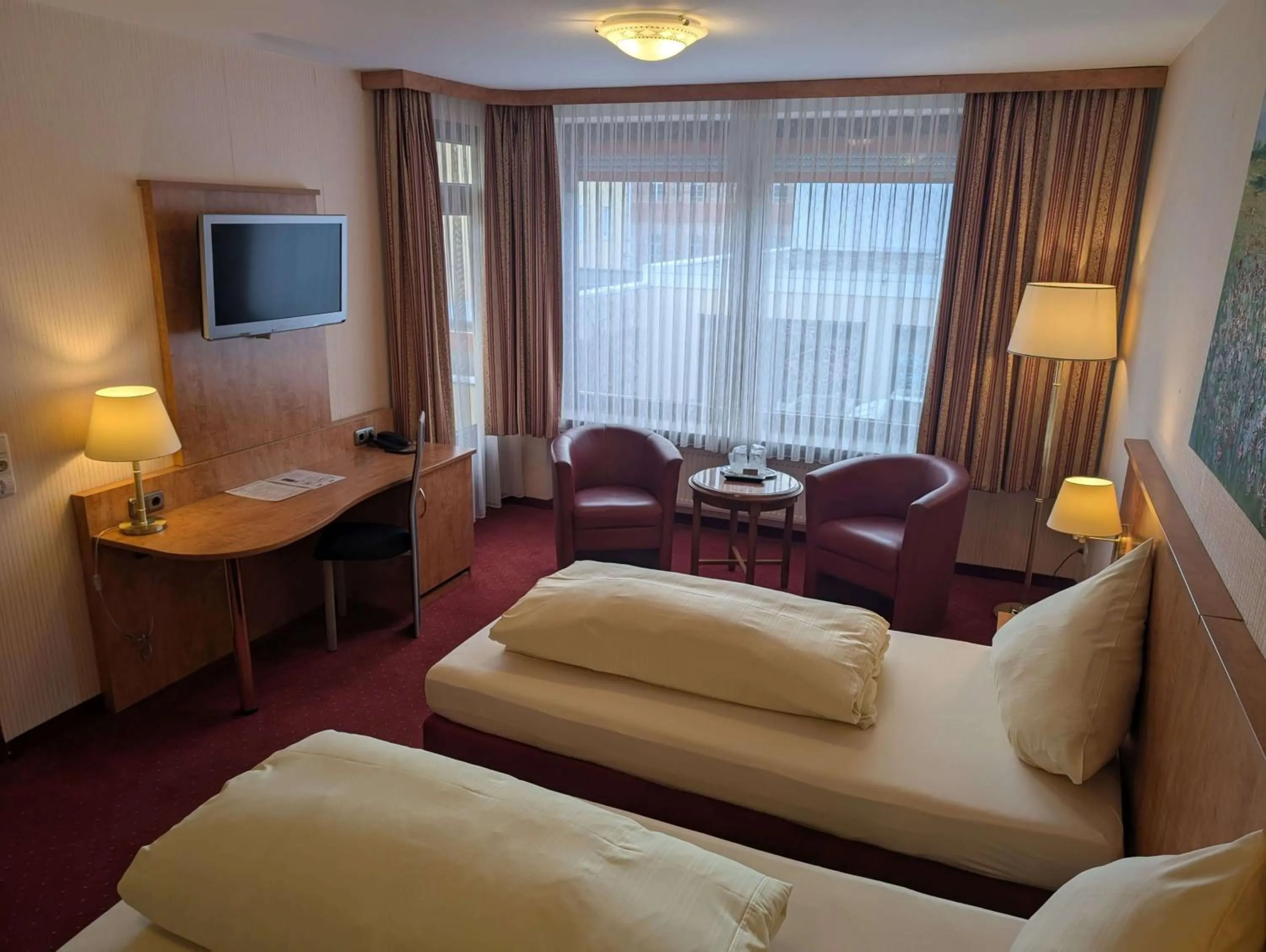 Bed in Stadthotel Augsburg