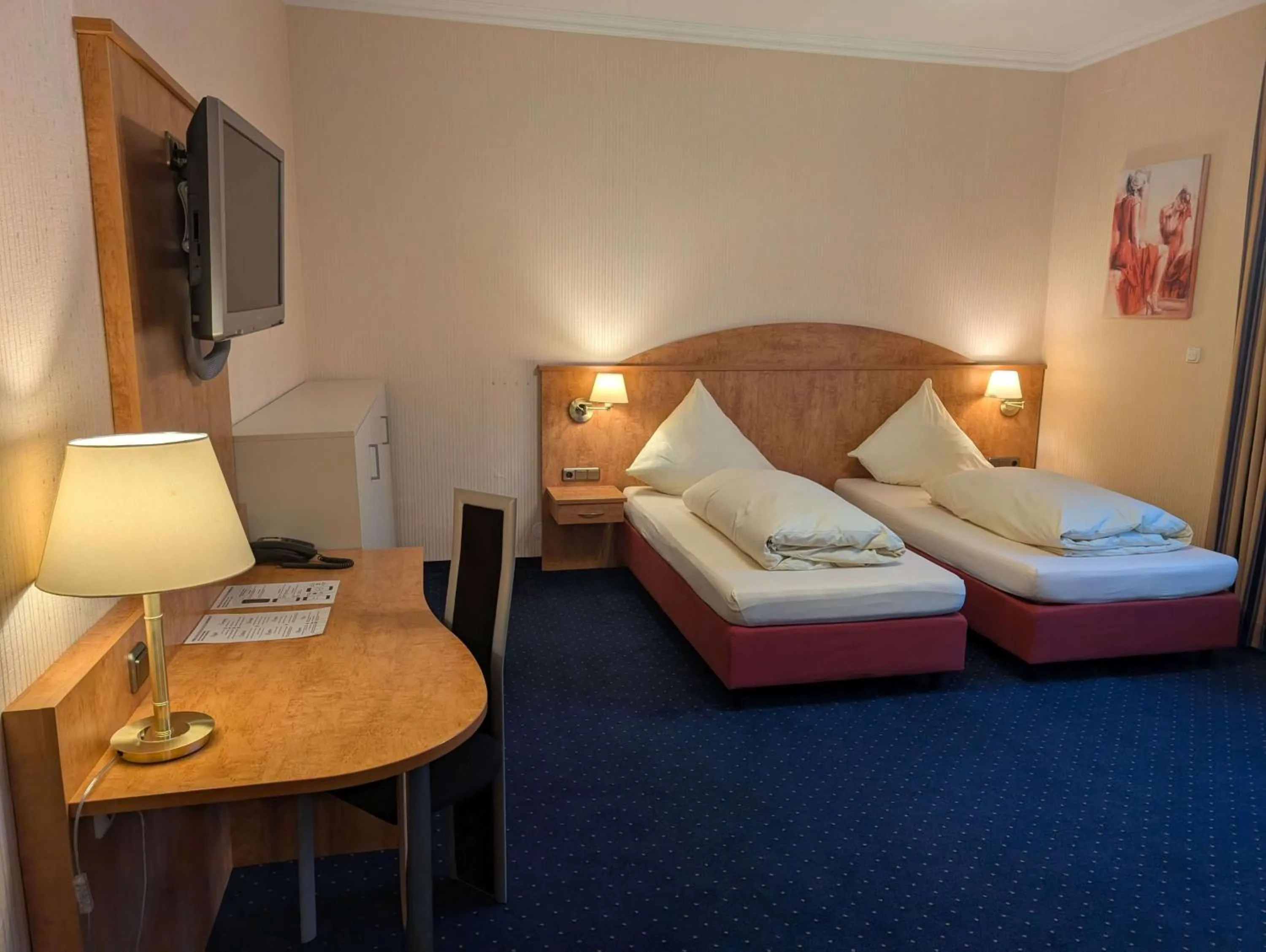 Bed in Stadthotel Augsburg