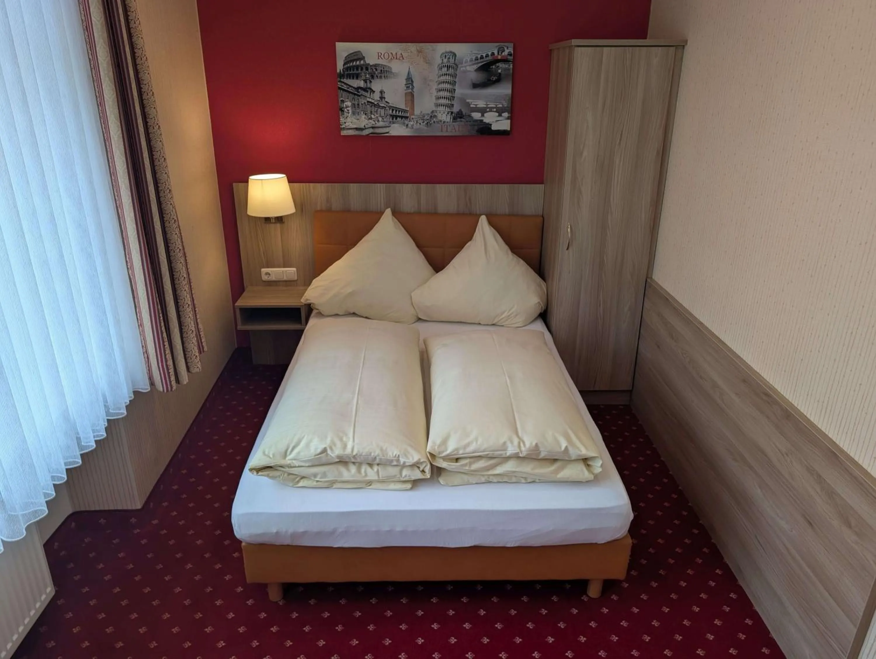 Bed in Stadthotel Augsburg