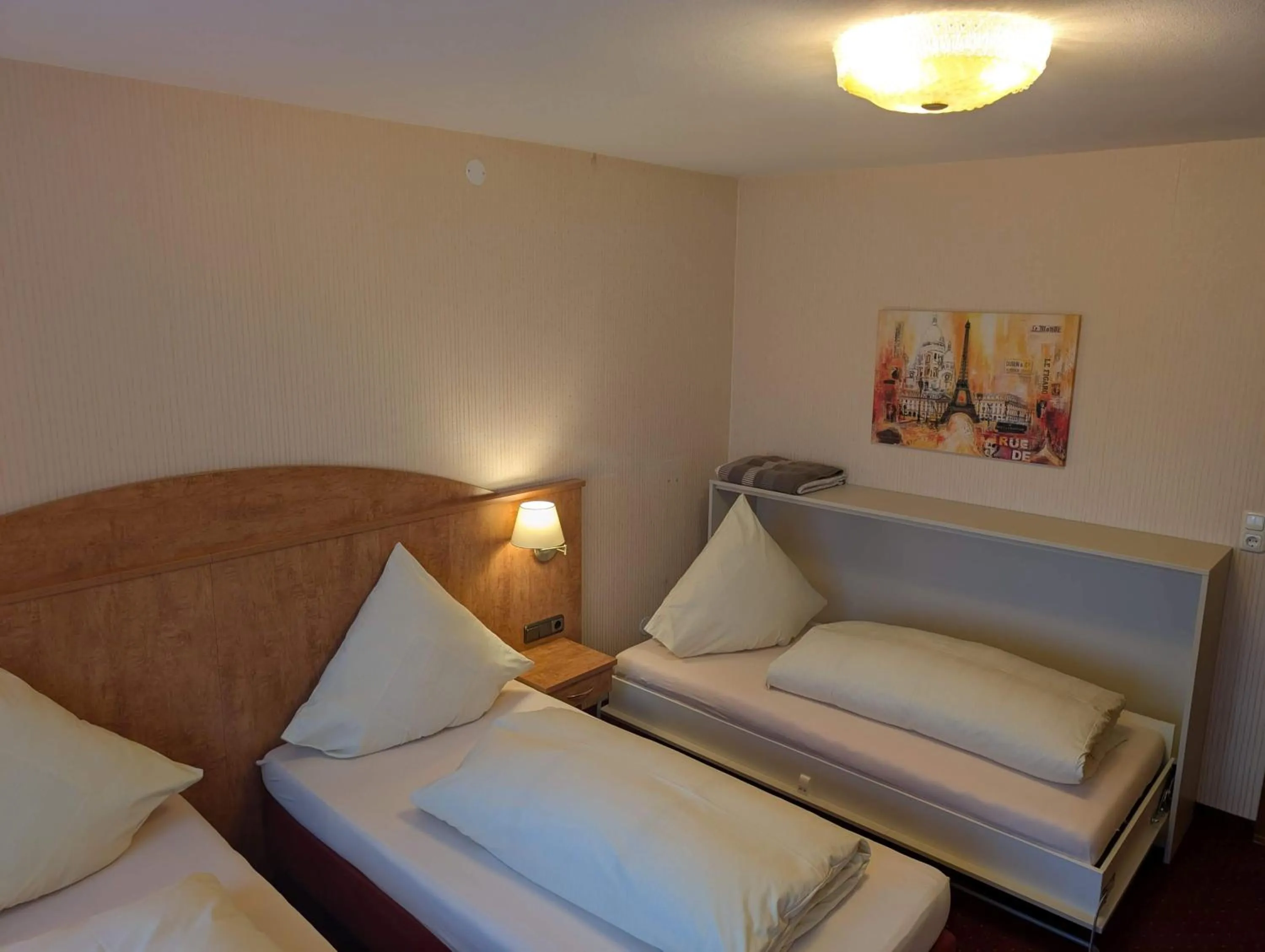 Bed in Stadthotel Augsburg