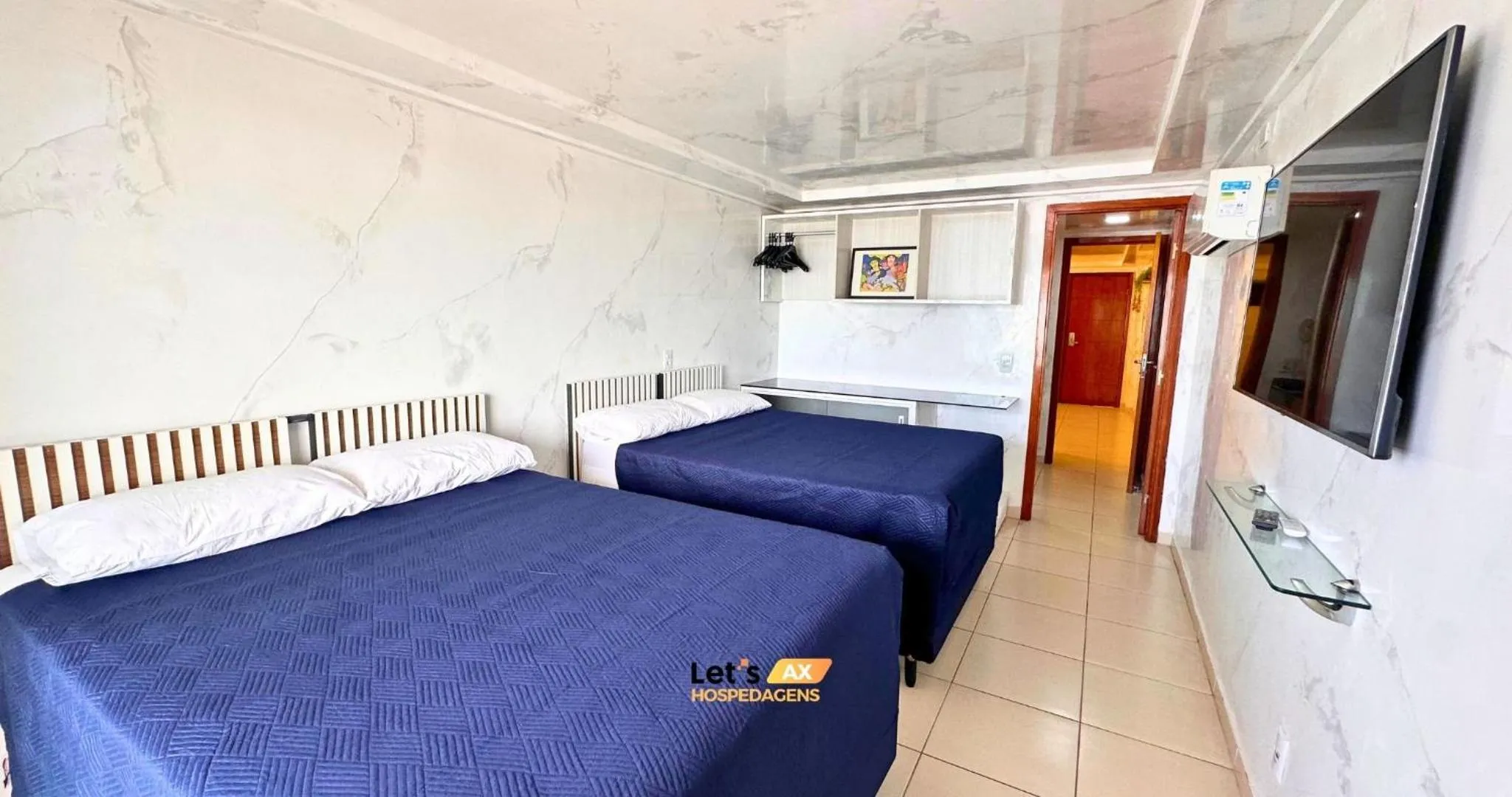 Bed in AX Blue Suítes