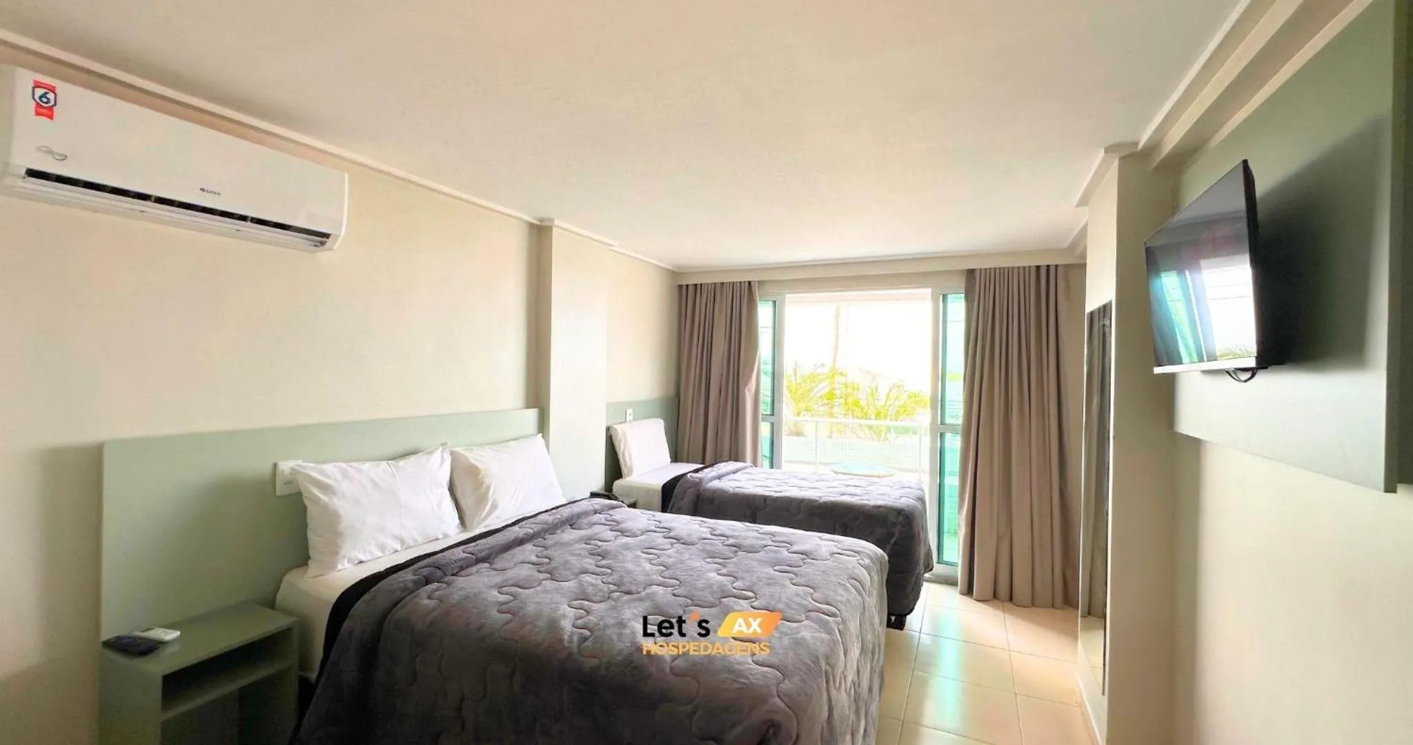 Bed in AX Blue Suítes