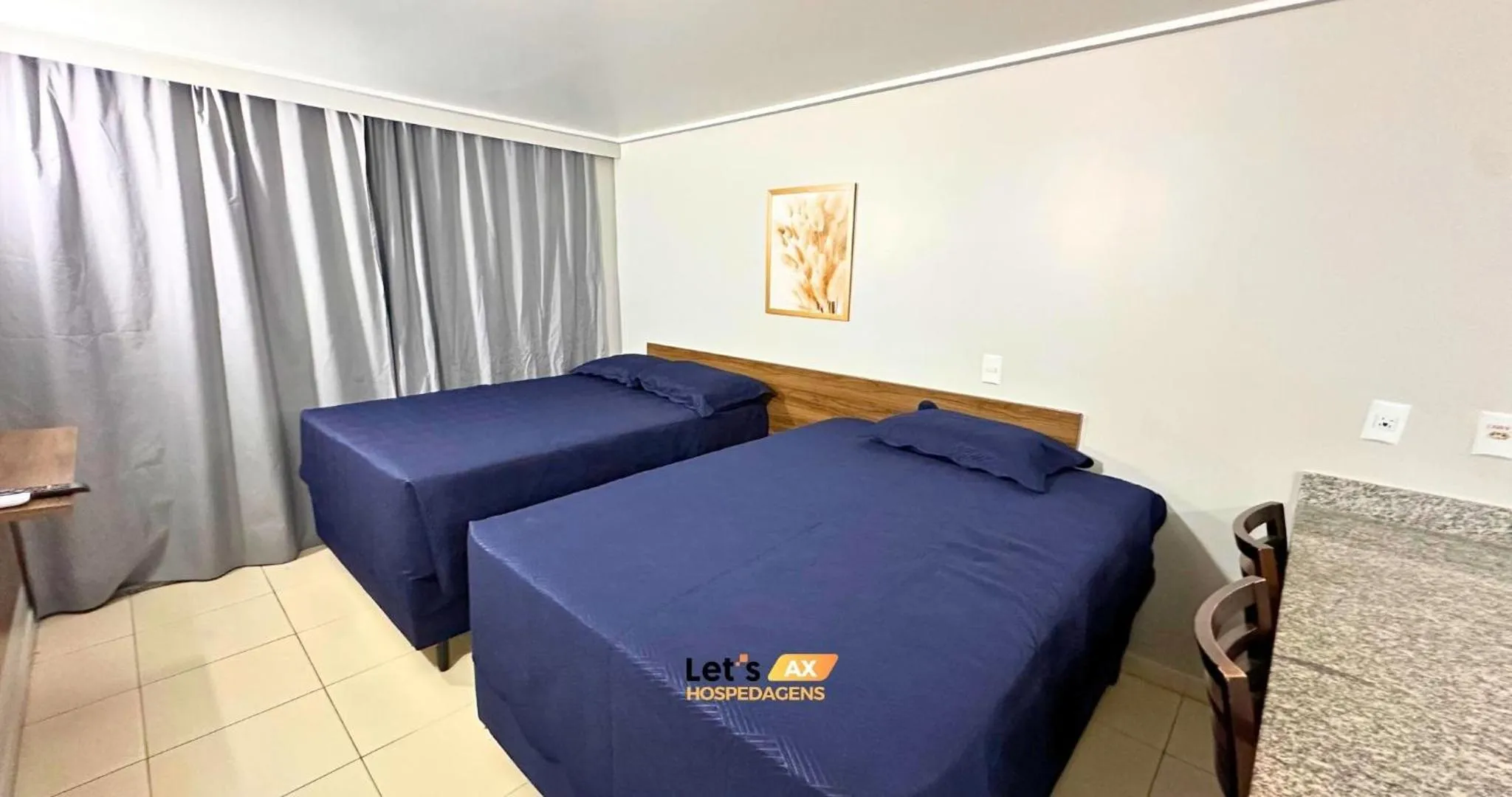 Photo of the whole room, Bed in AX Blue Suítes