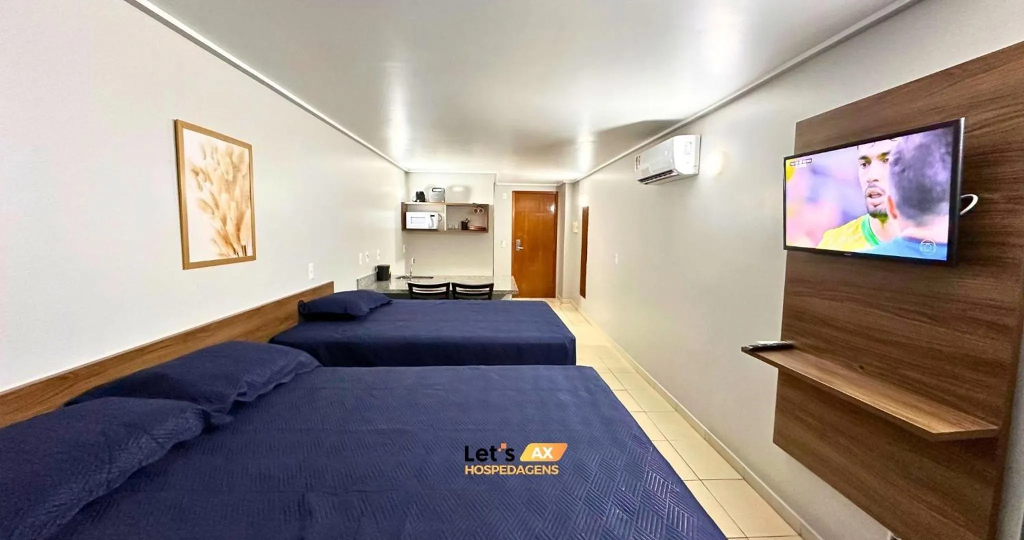 Photo of the whole room, Bed in AX Blue Suítes