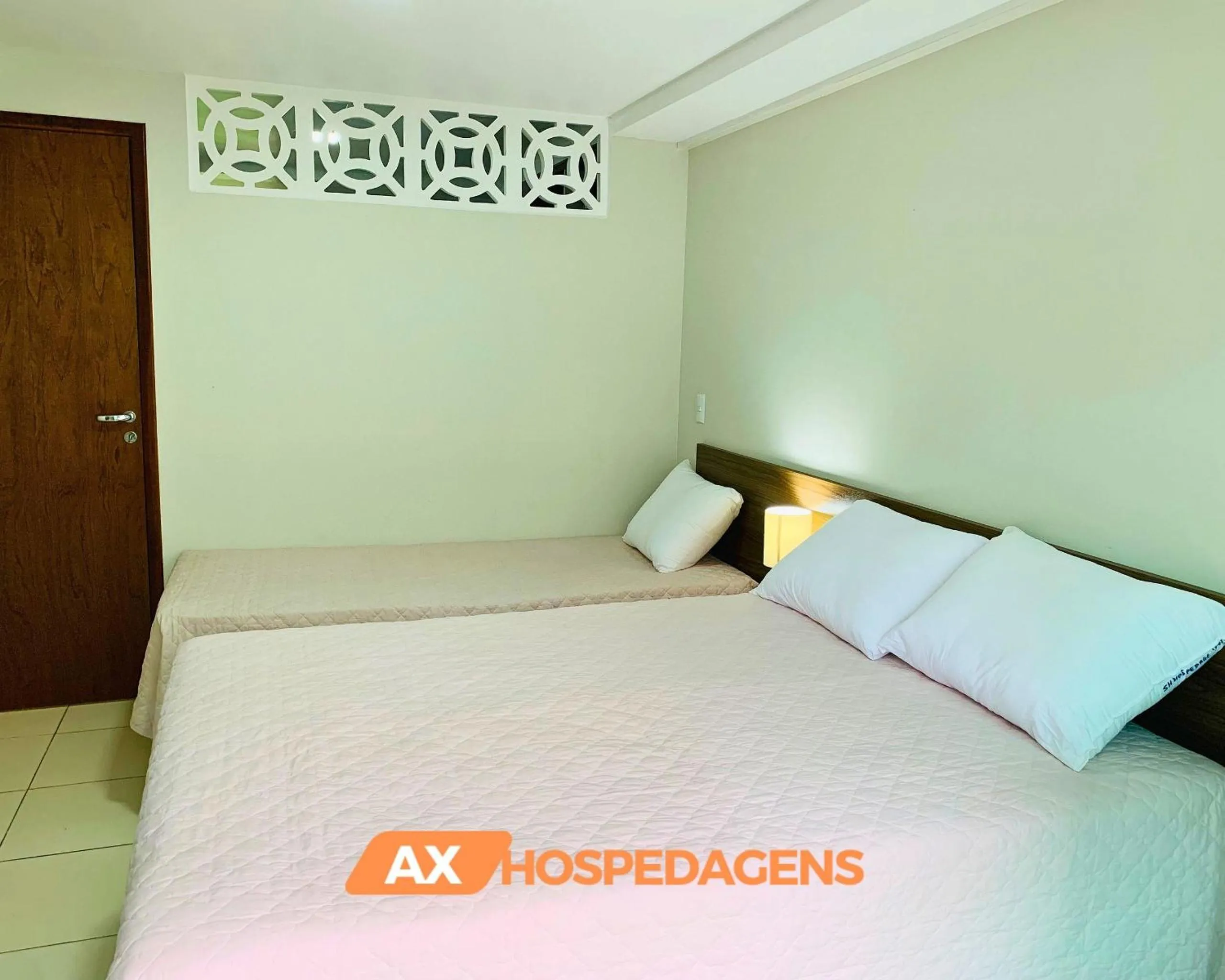 Bed in AX Blue Suítes