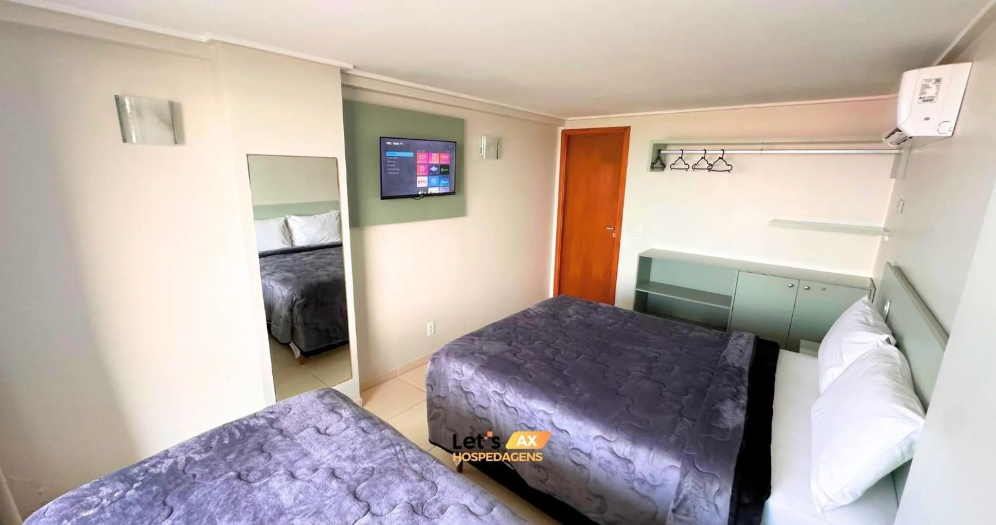 Bed in AX Blue Suítes