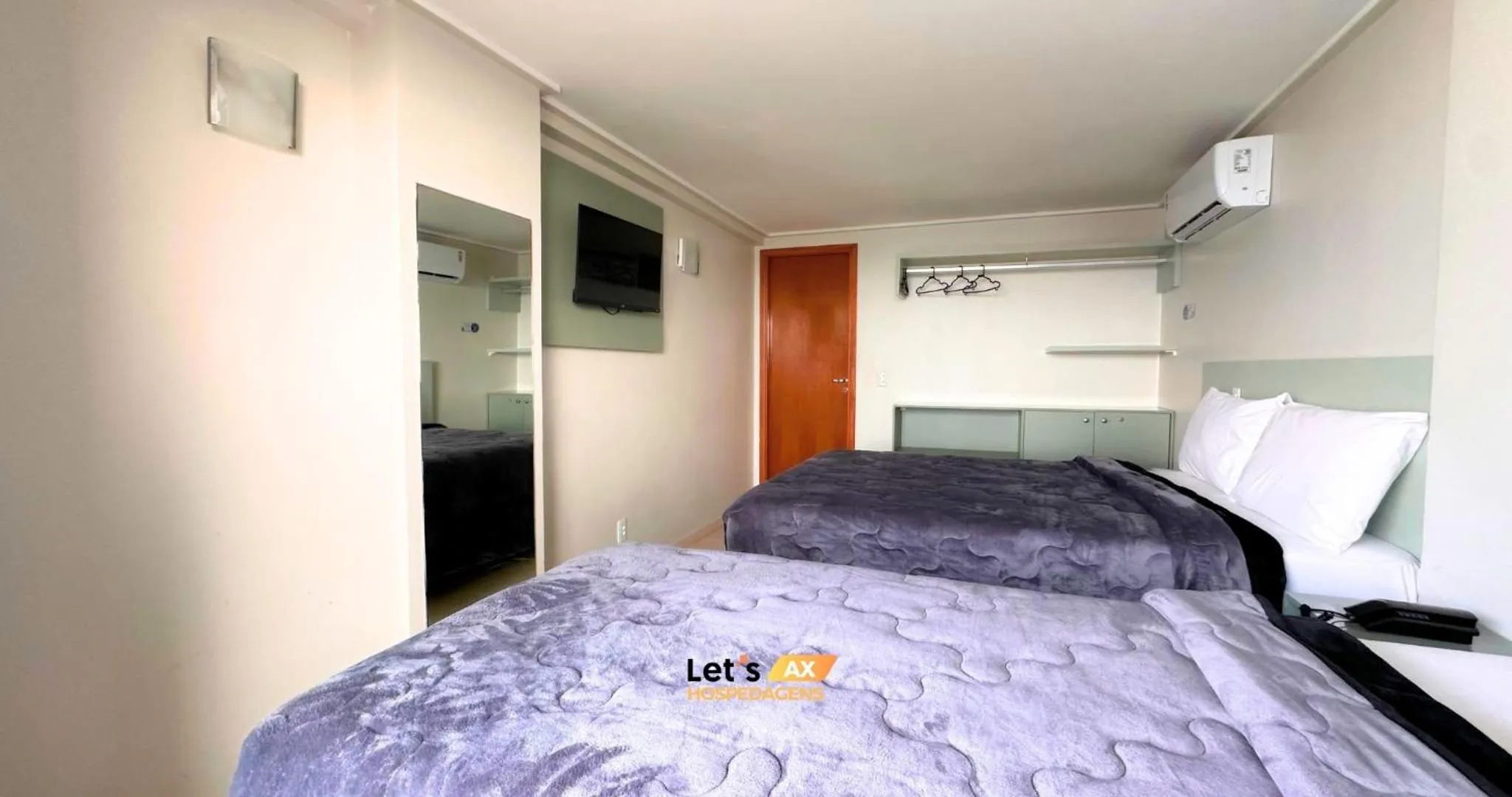 Bed in AX Blue Suítes