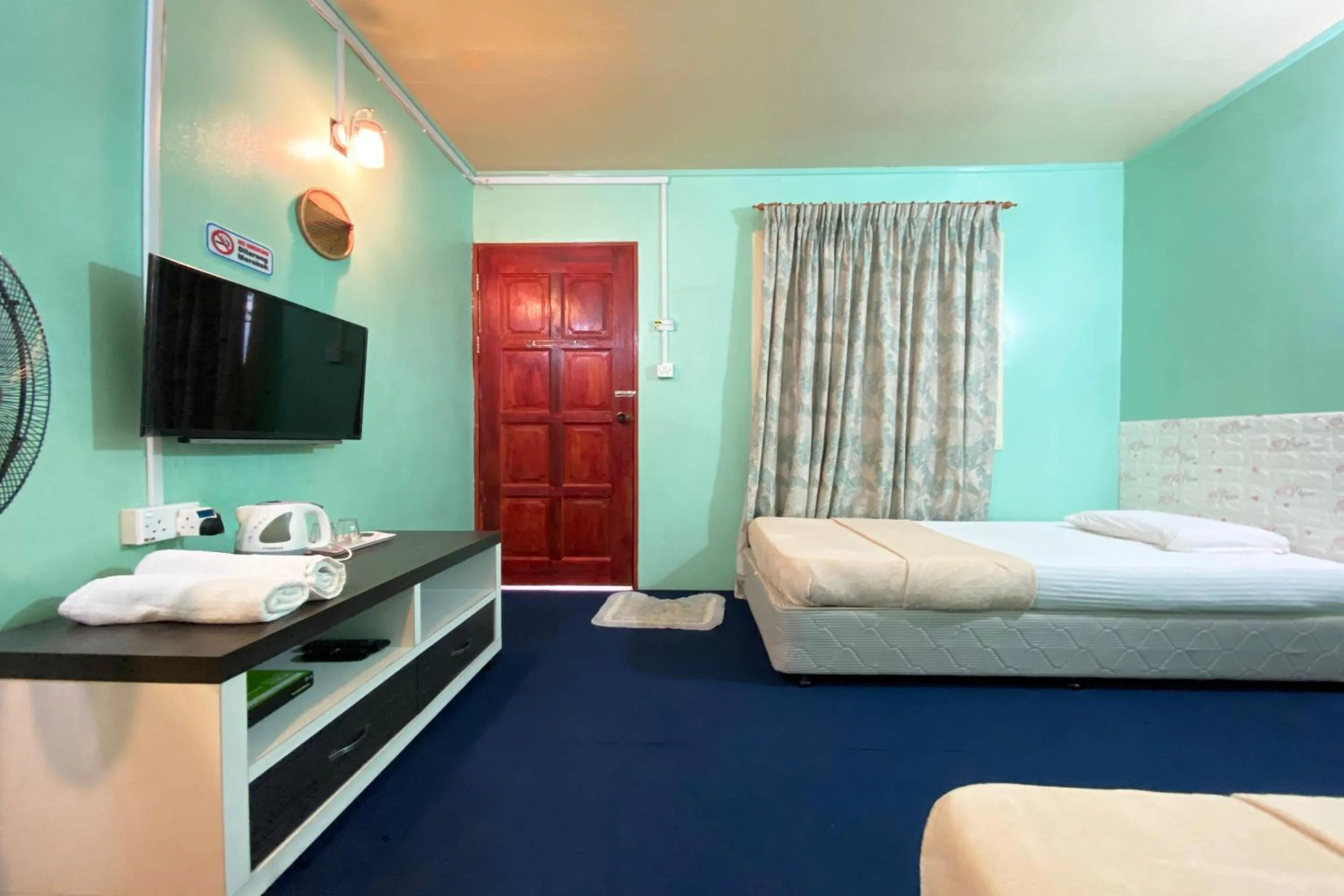 Bedroom, Bed in Hotel O Pogimpaan Homestay