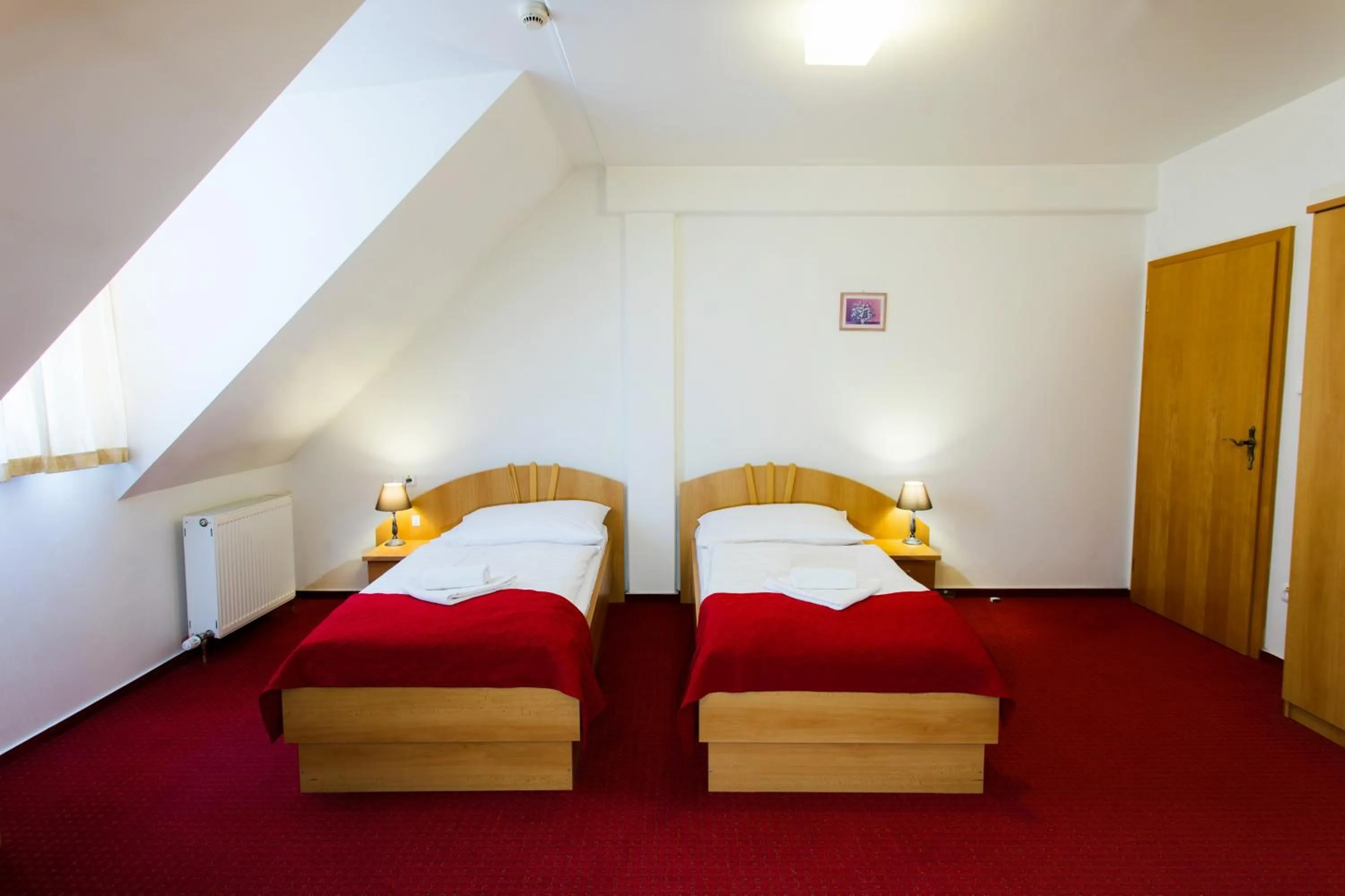 Photo of the whole room, Bed in Hotel pod Zámkom