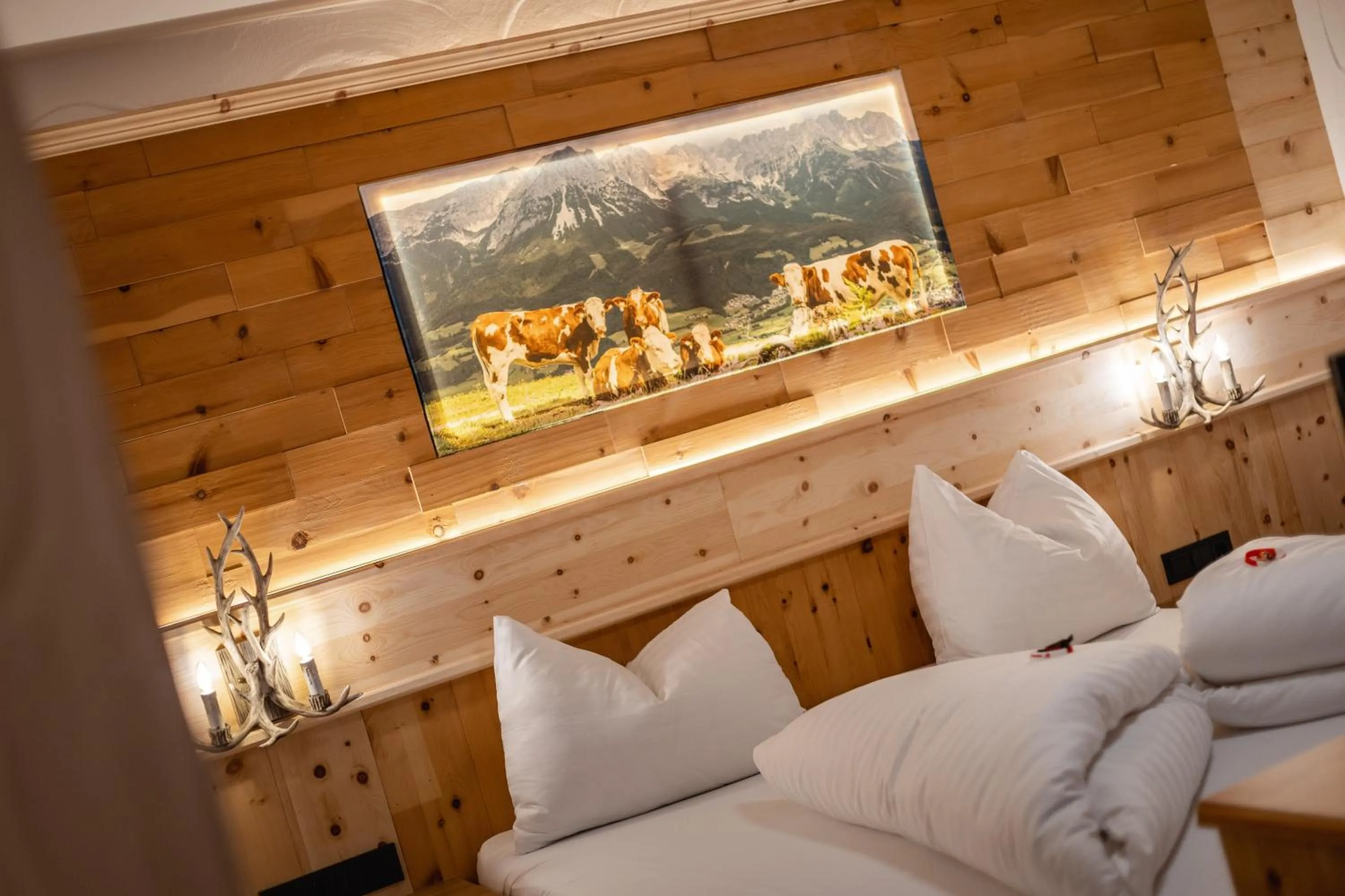 Bed in Hotel Restaurant Hexenalm