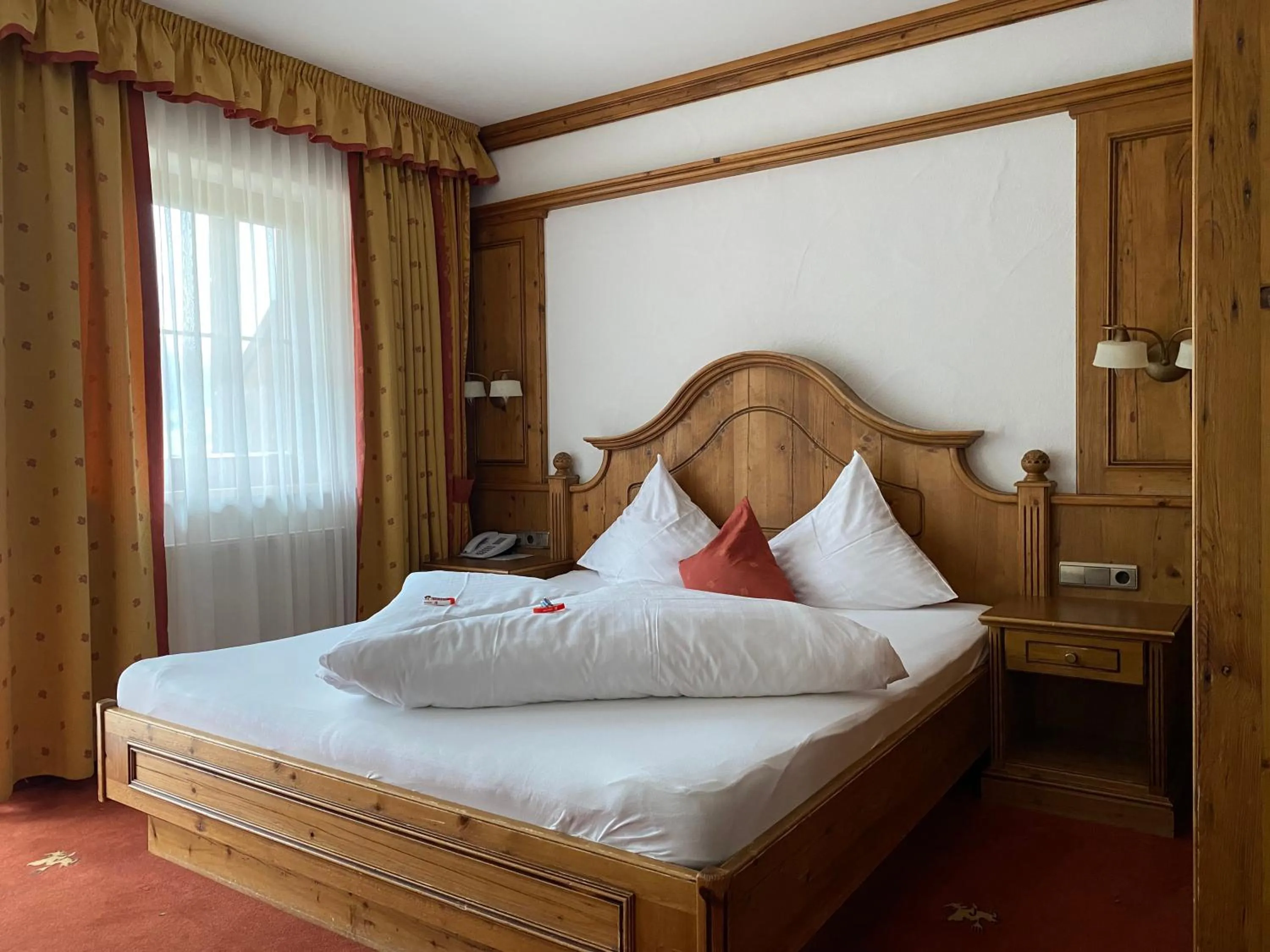 Bed in Hotel Restaurant Hexenalm