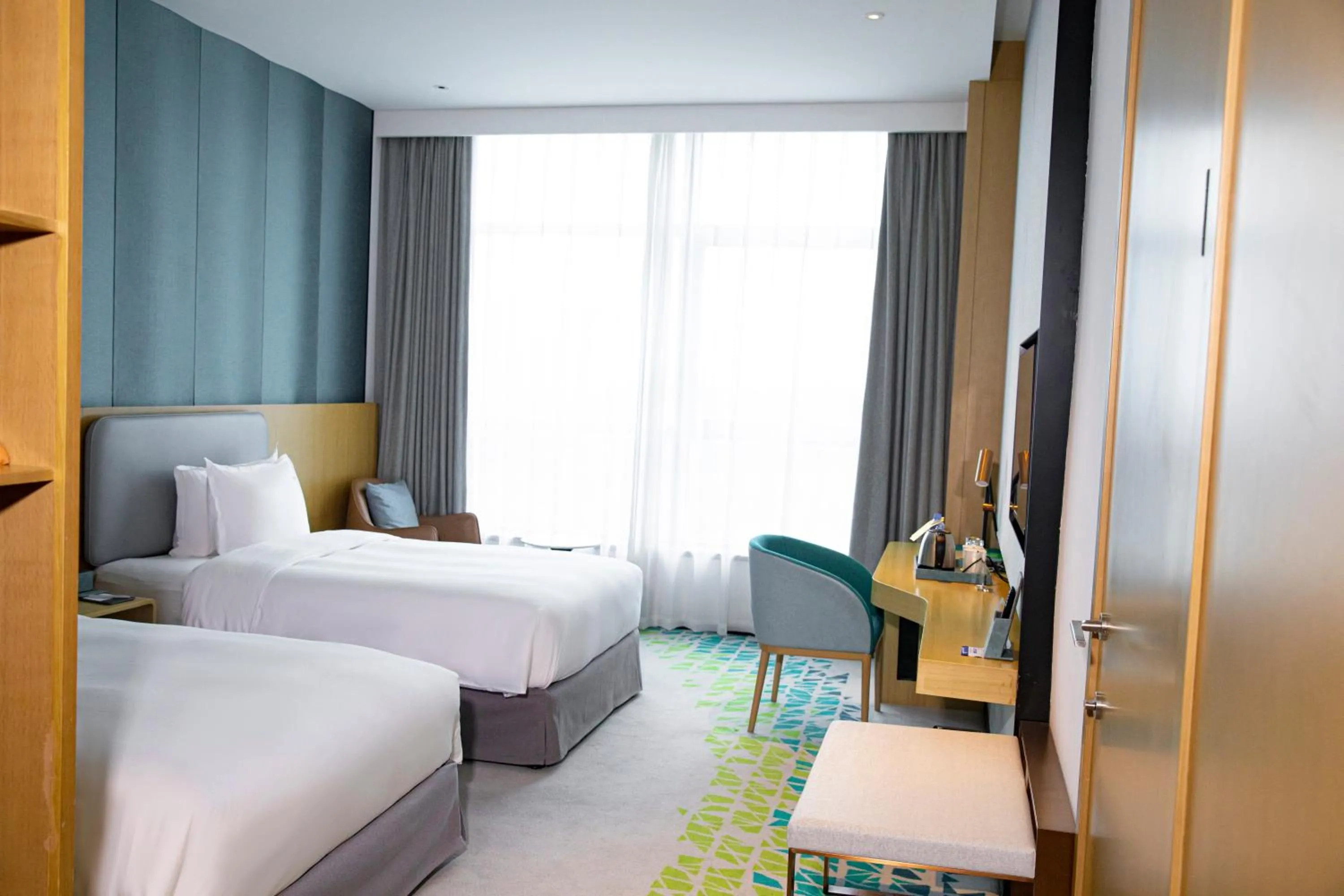 Bed in Holiday Inn Fuyang by IHG