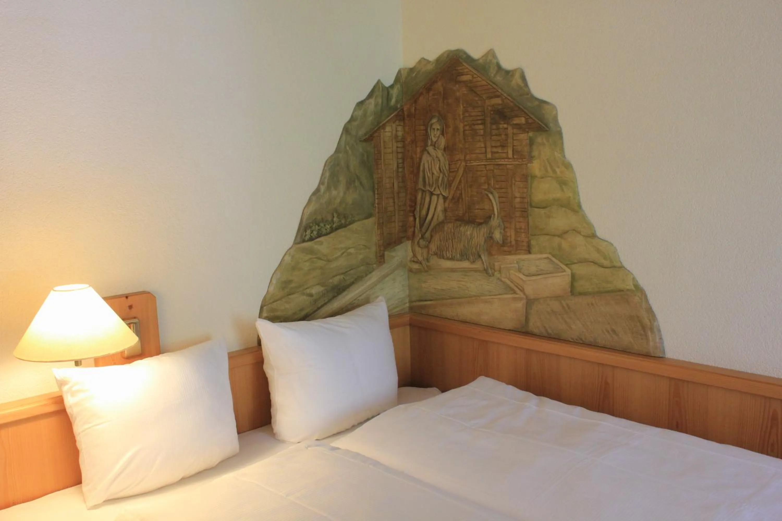 Bed in Grichting Hotel & Serviced Apartments