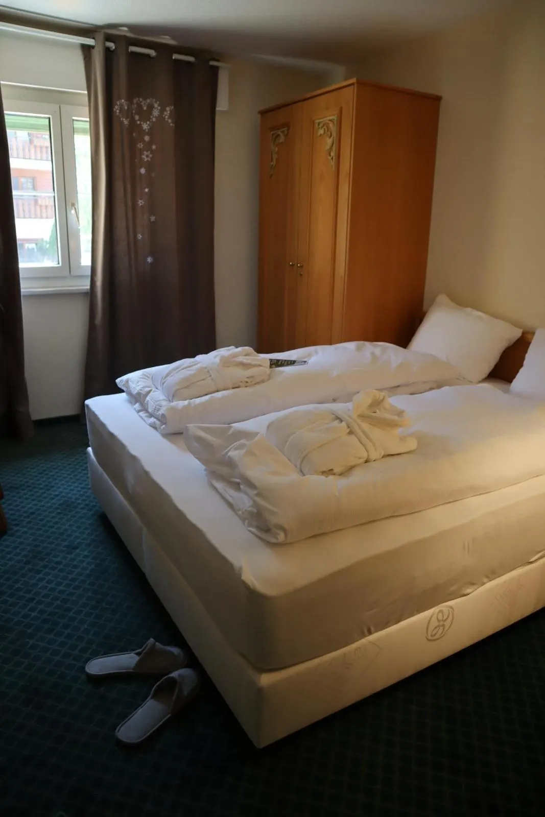 Bed in Grichting Hotel & Serviced Apartments