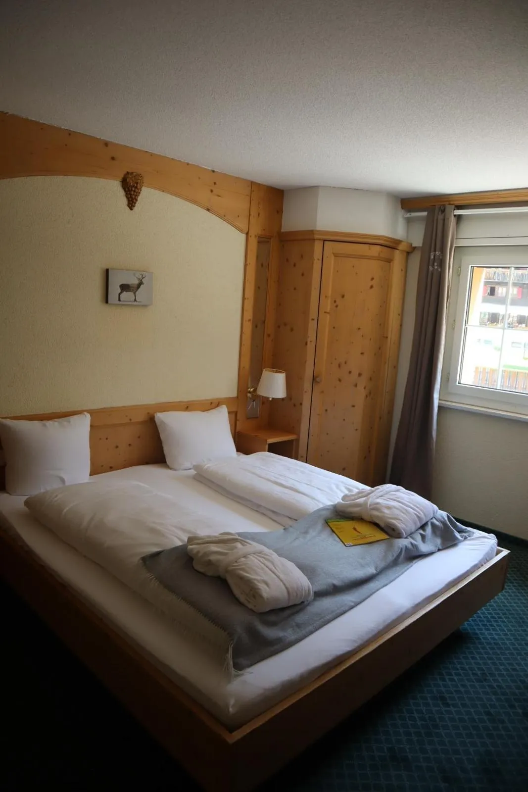 Bed in Grichting Hotel & Serviced Apartments