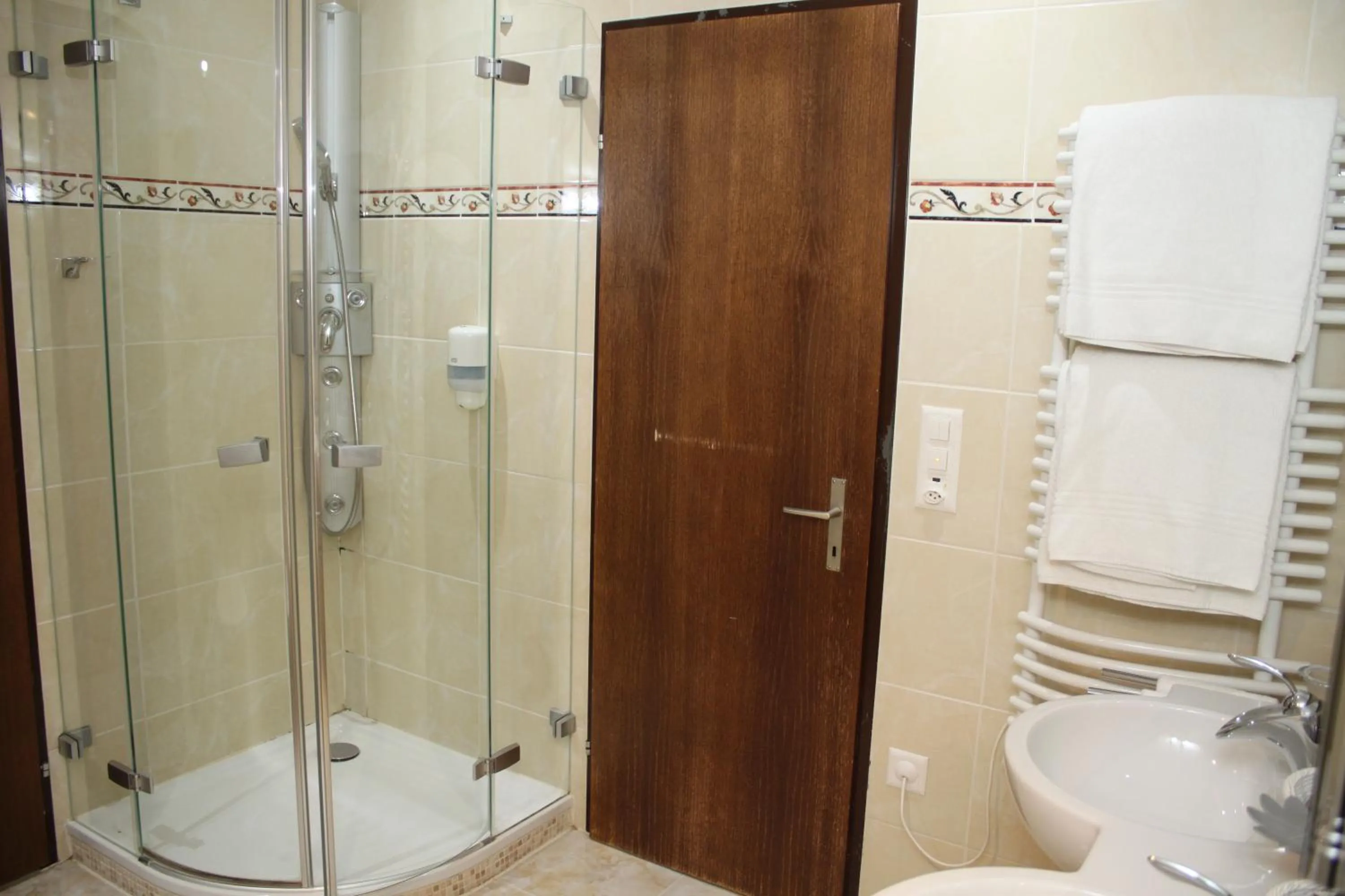 Shower in Grichting Hotel & Serviced Apartments