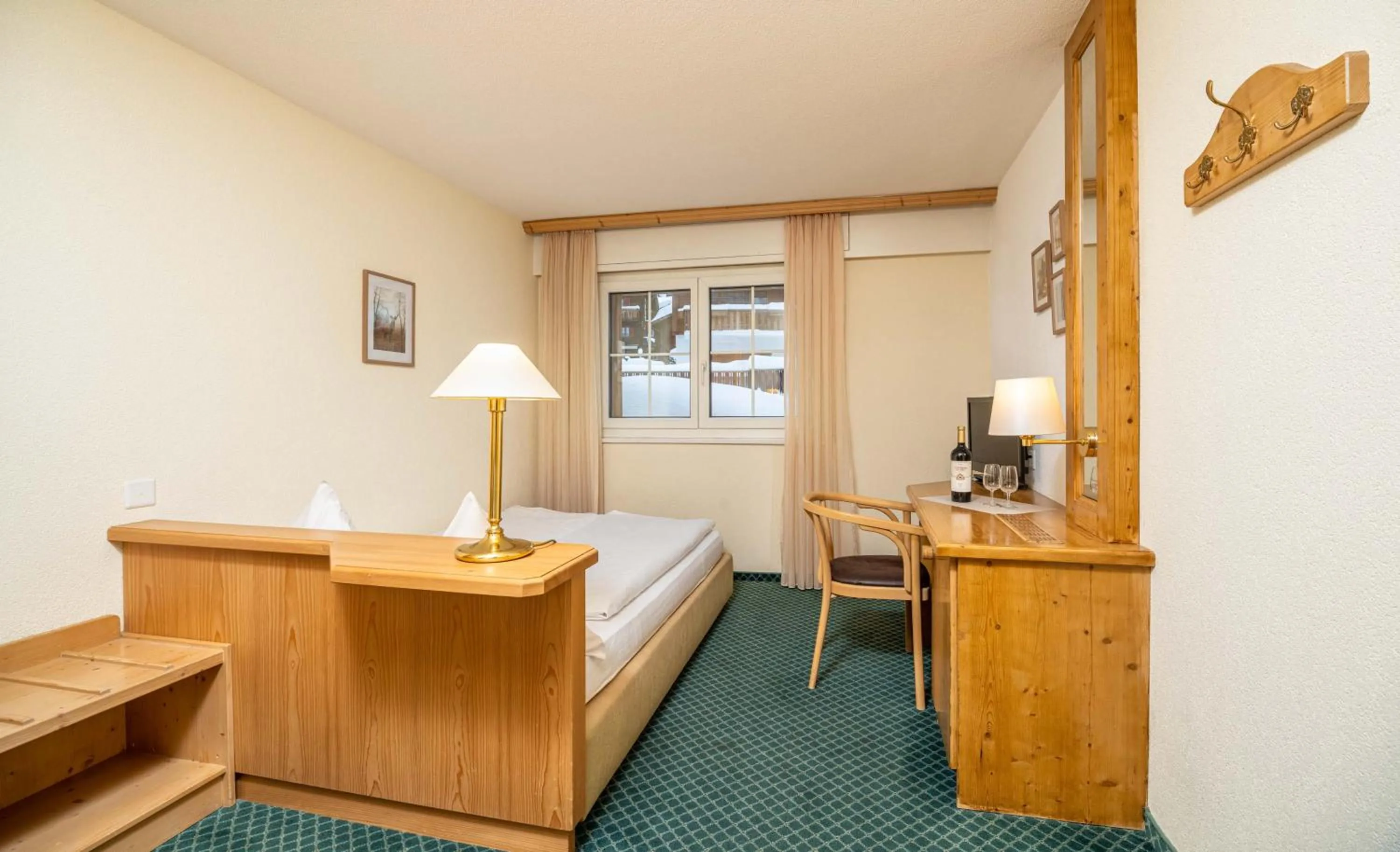 Photo of the whole room, Bed in Grichting Hotel & Serviced Apartments