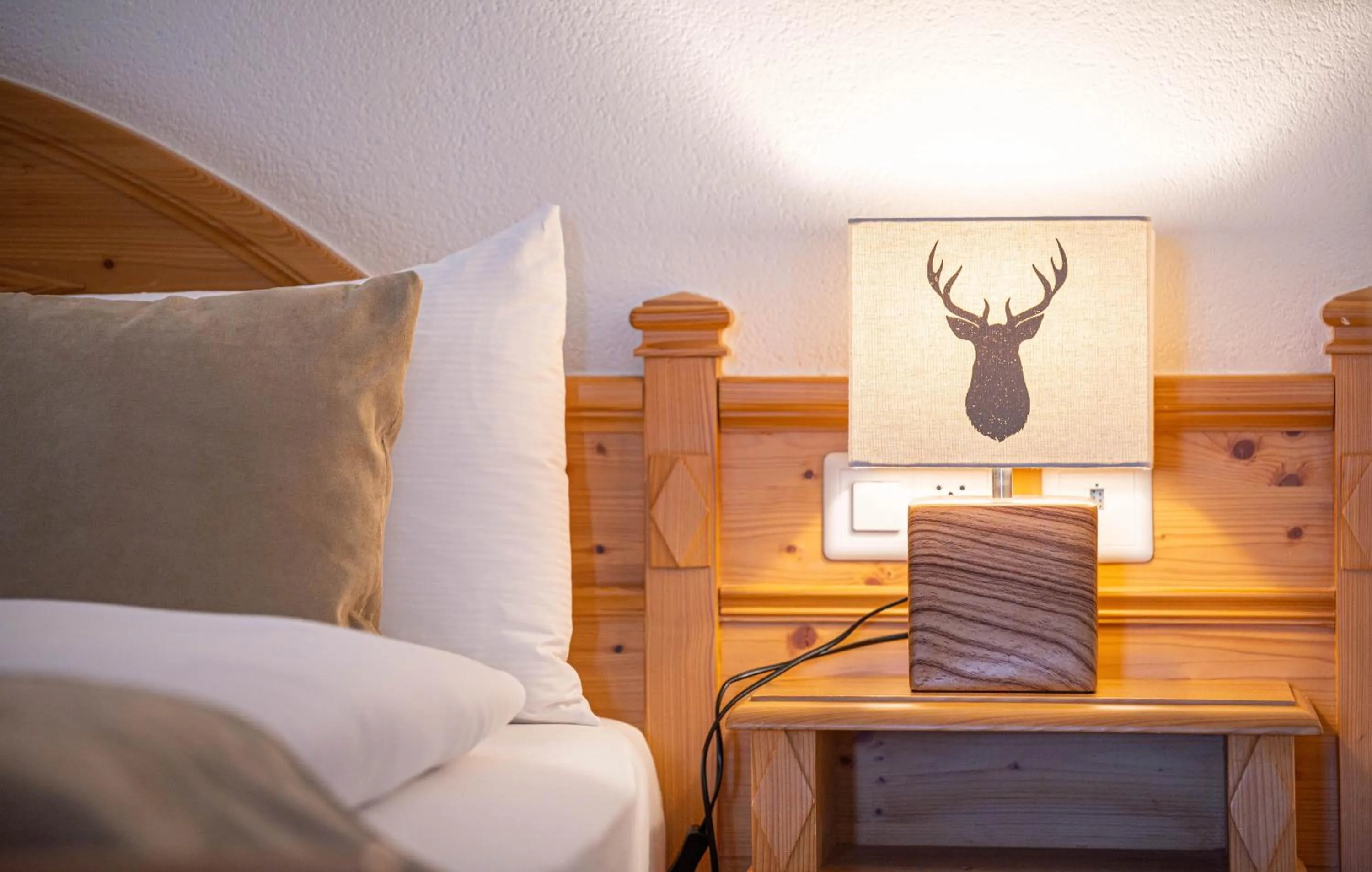 Bedroom in Grichting Hotel & Serviced Apartments