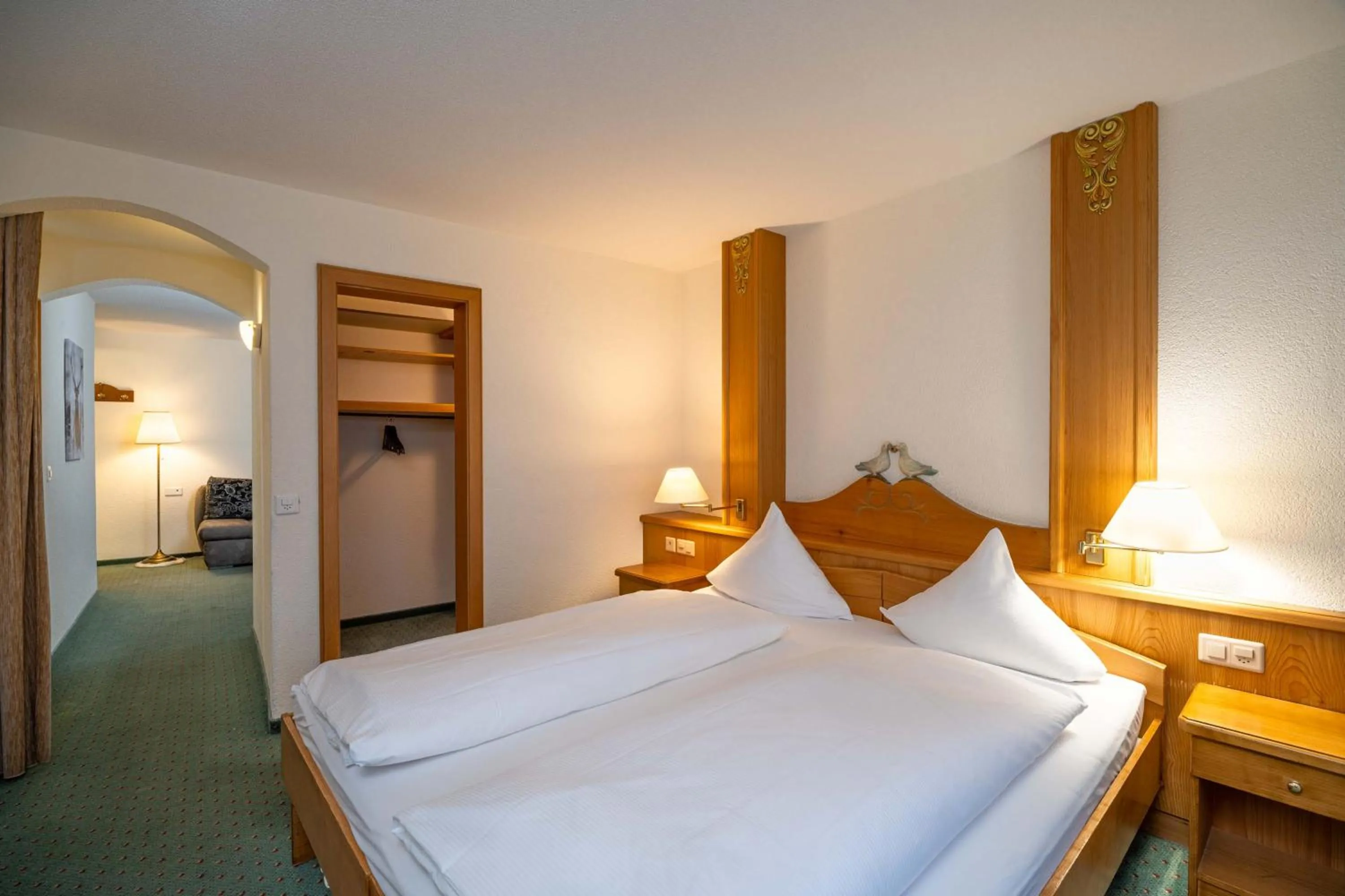 Photo of the whole room, Bed in Grichting Hotel & Serviced Apartments