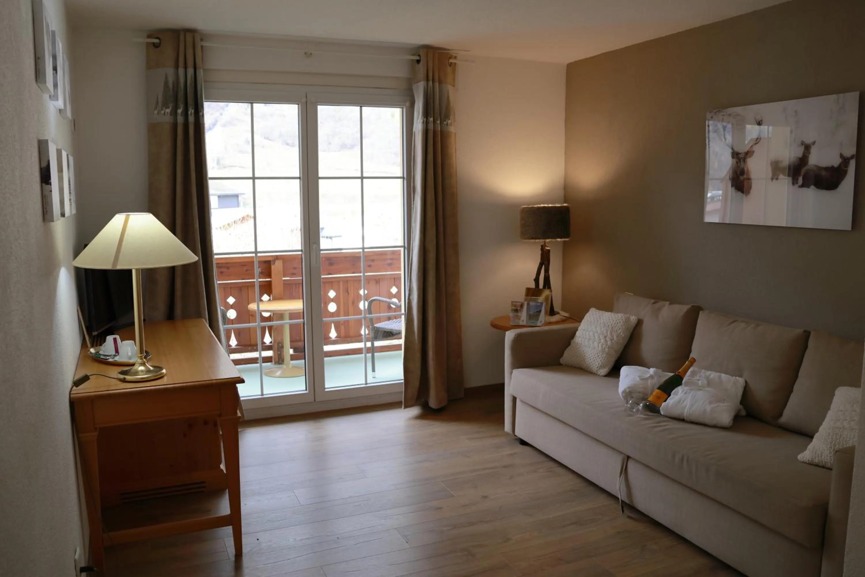 TV and multimedia in Grichting Hotel & Serviced Apartments